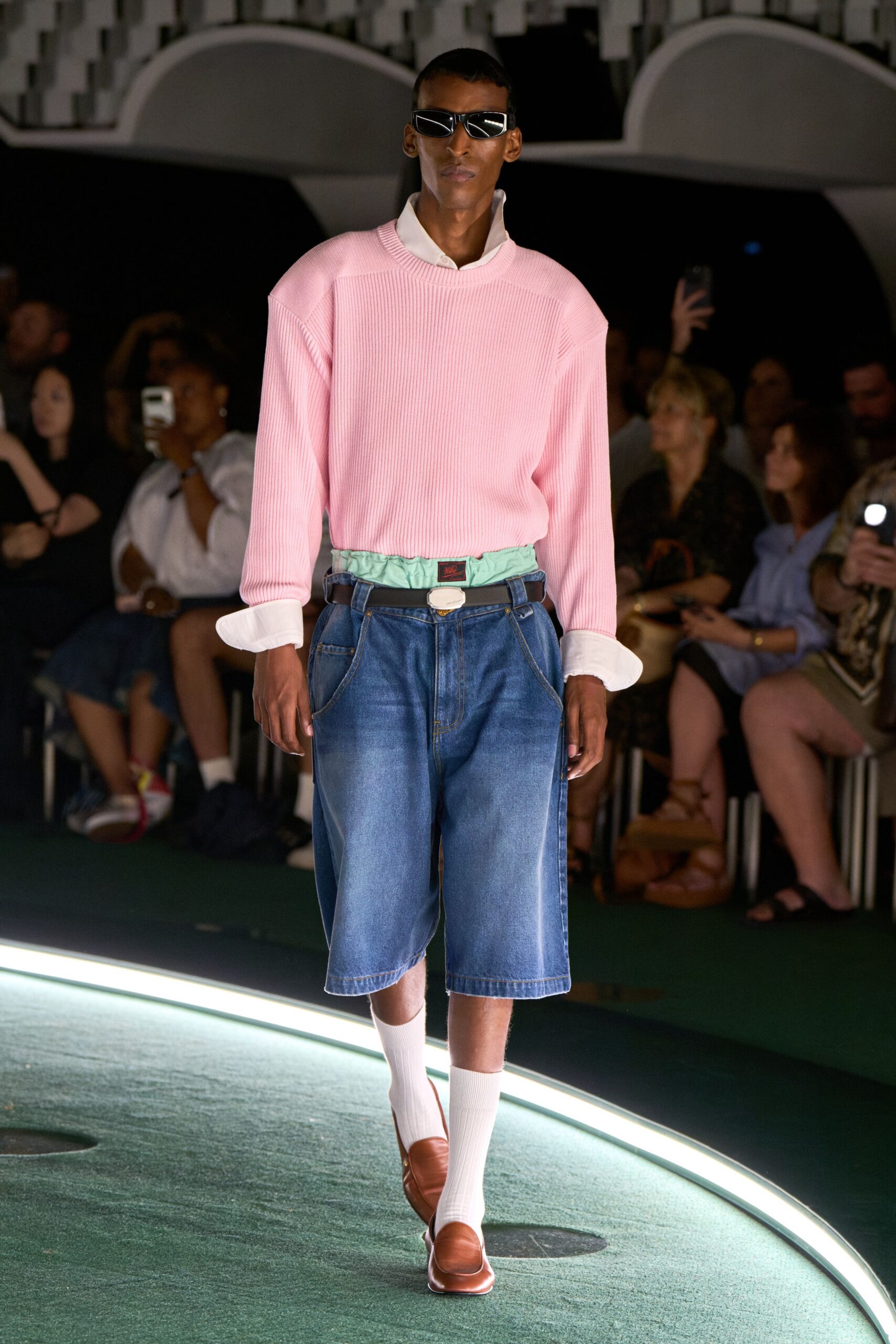 pink oversized sweater with denim shorts