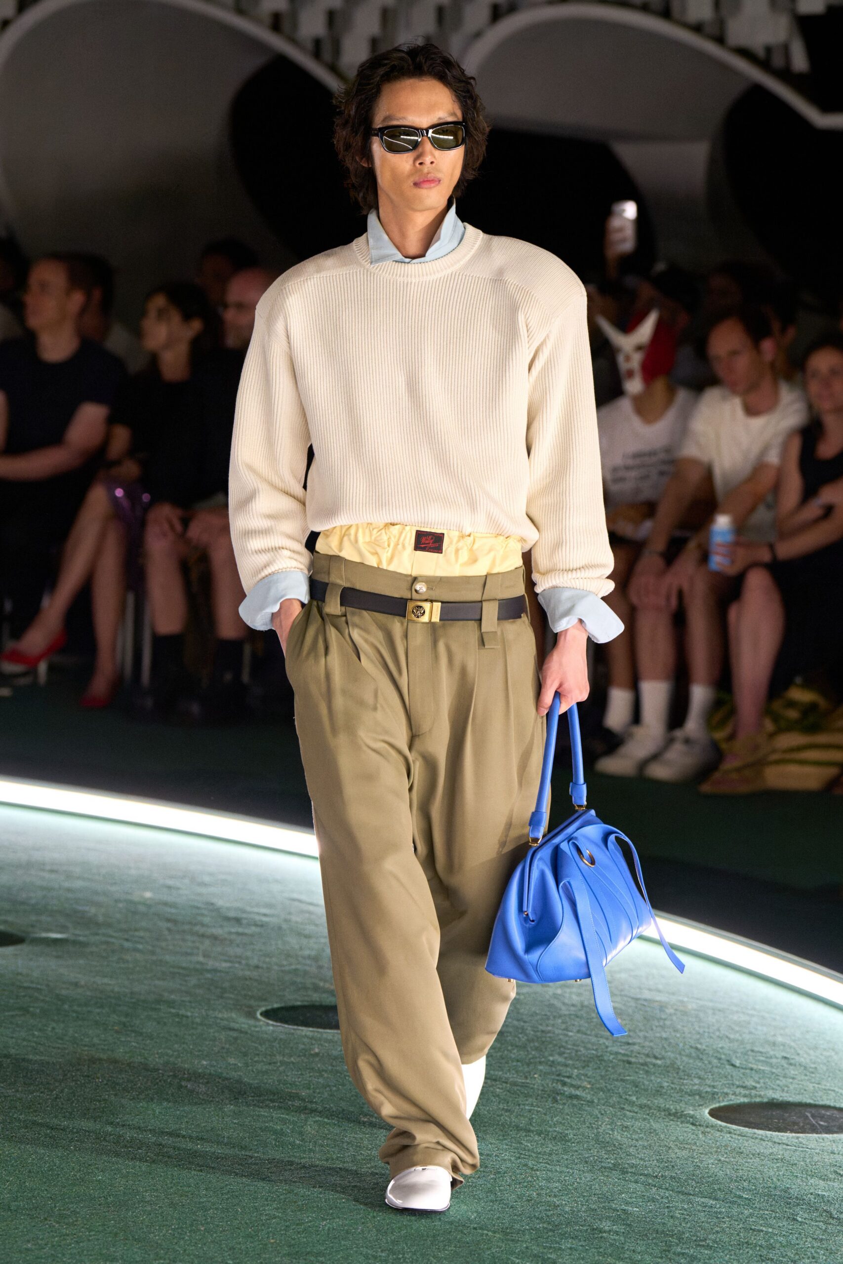 white relaxed sweater with beige pants