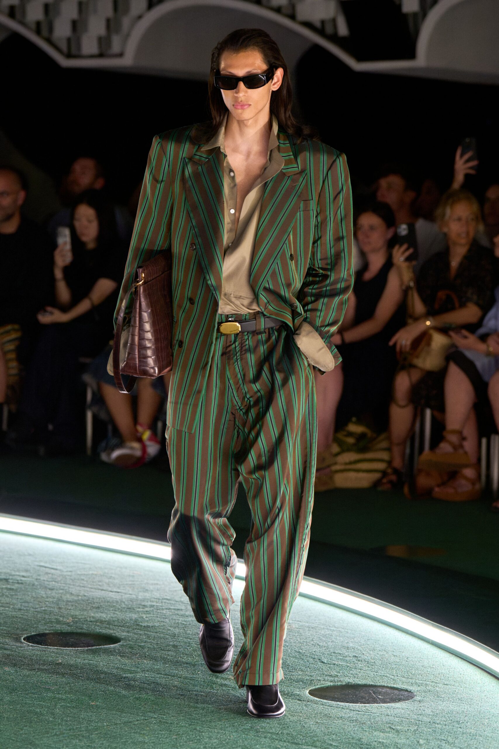 green striped suit with beige shirt