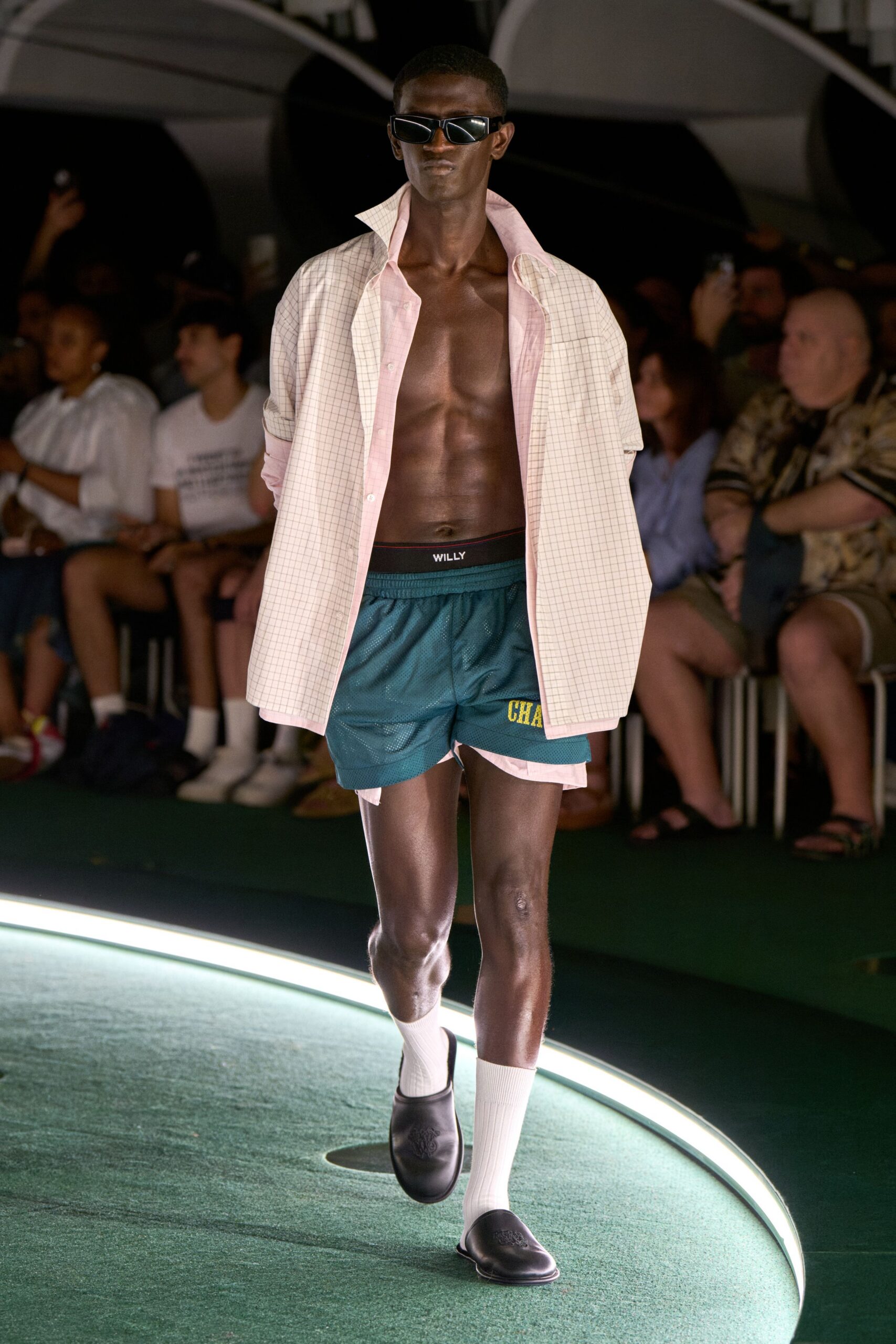 pink checked shirt green shorts