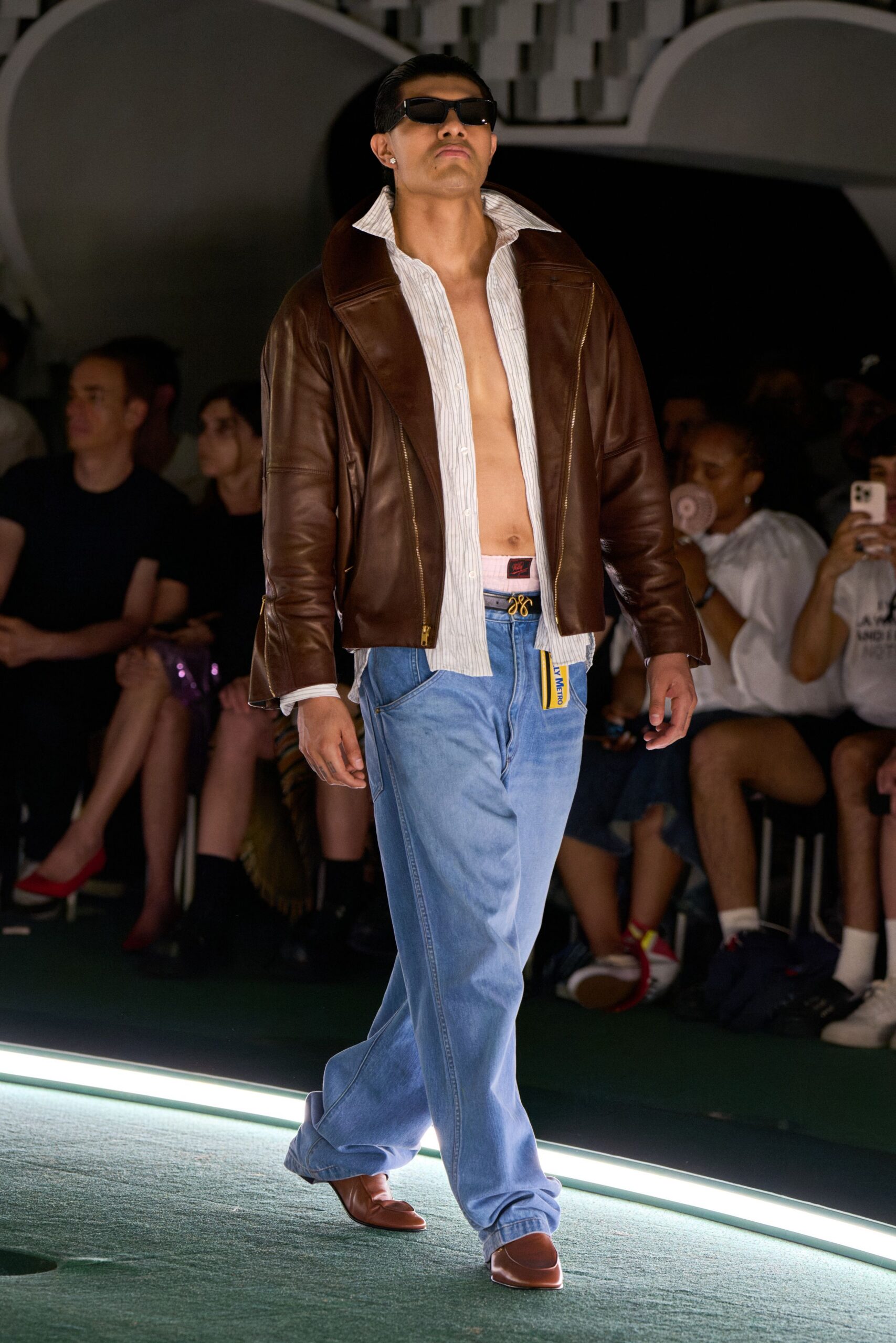 brown leather jacket with denim pants