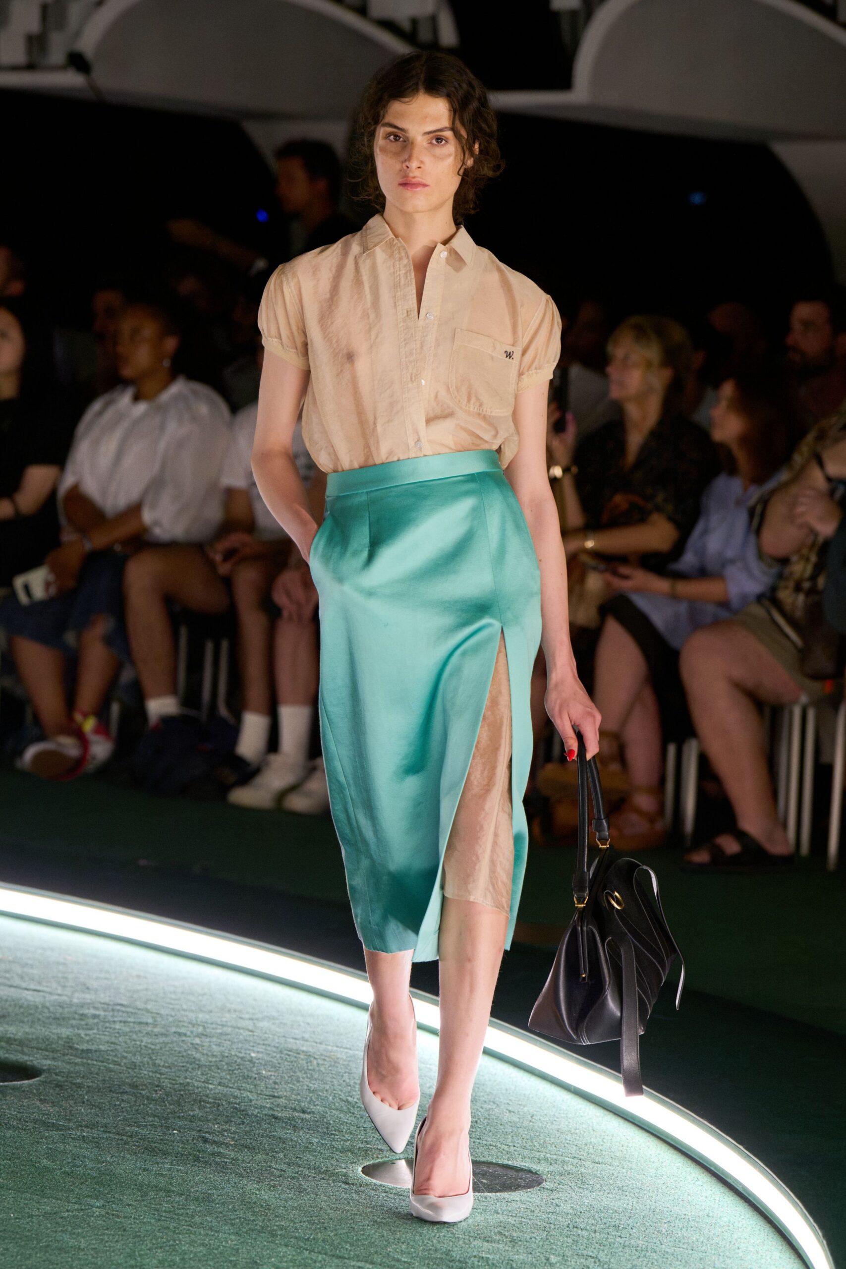 beige shirt teal skirt white shoes