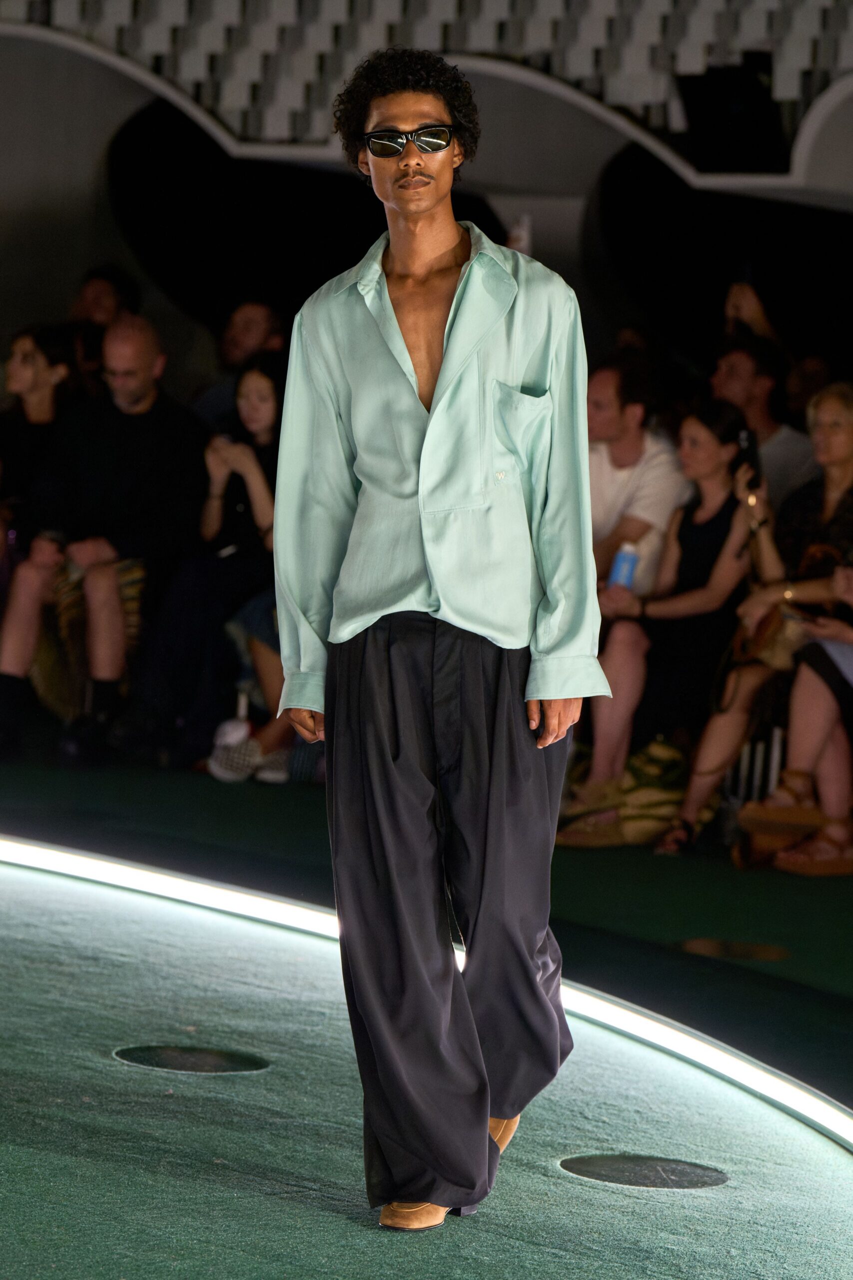 mint silk relaxed shirt with black pants
