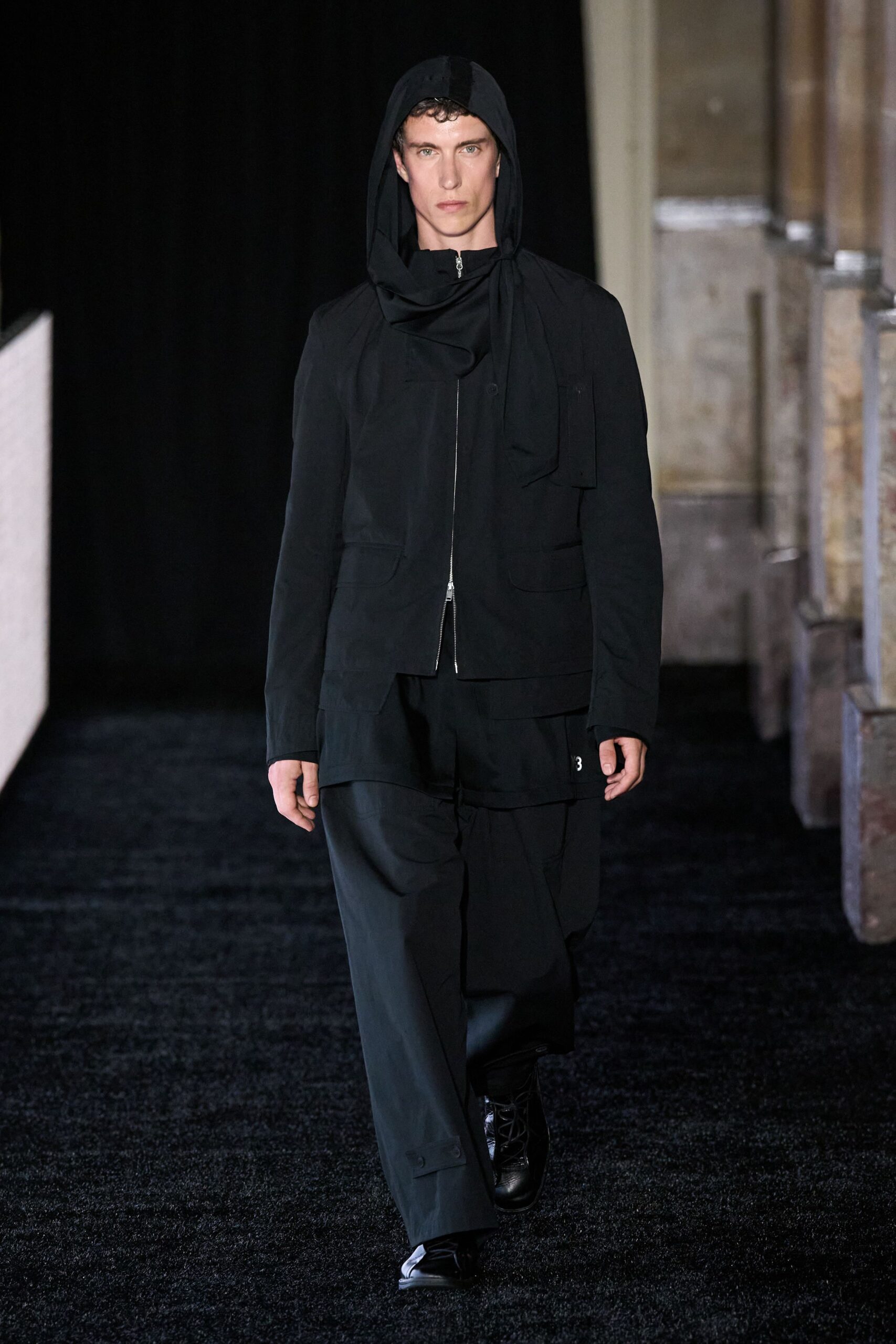 black fitted jacket and relaxed pants