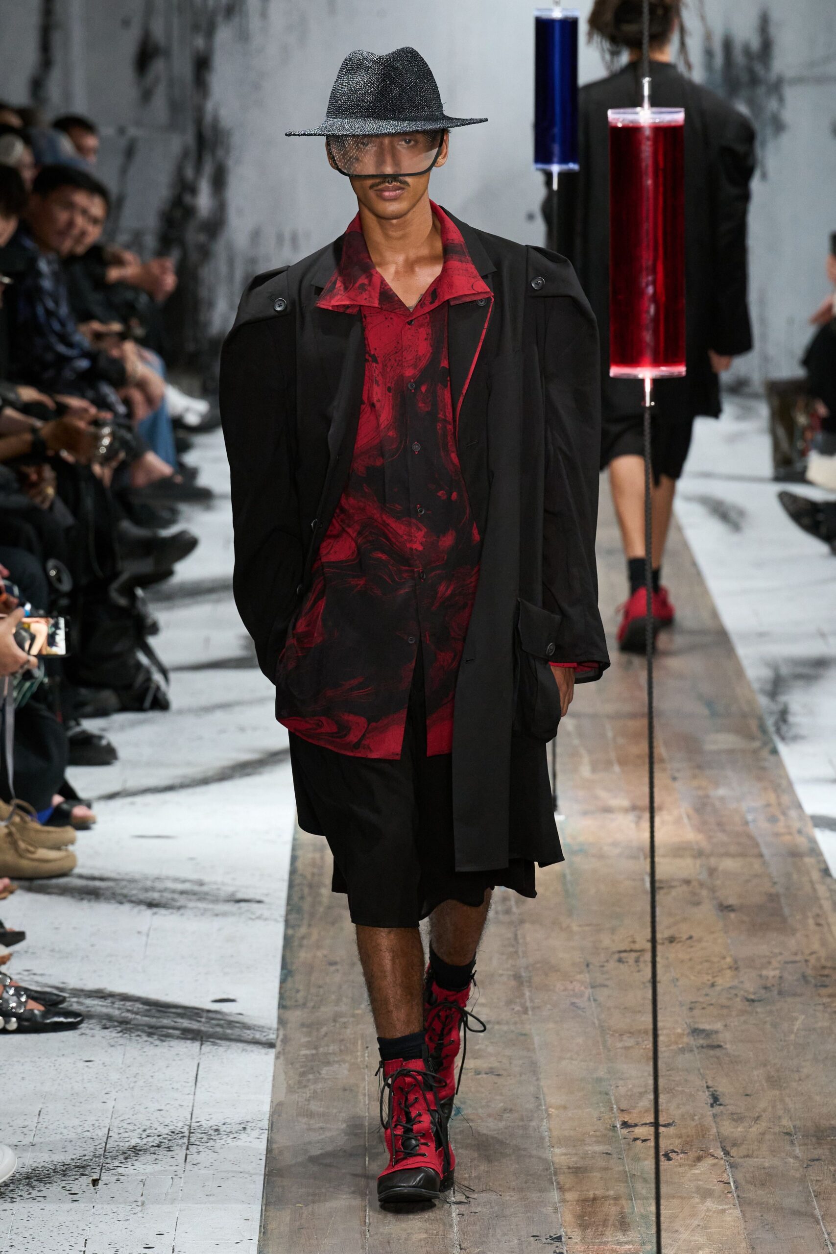 oversized black coat with red shirt