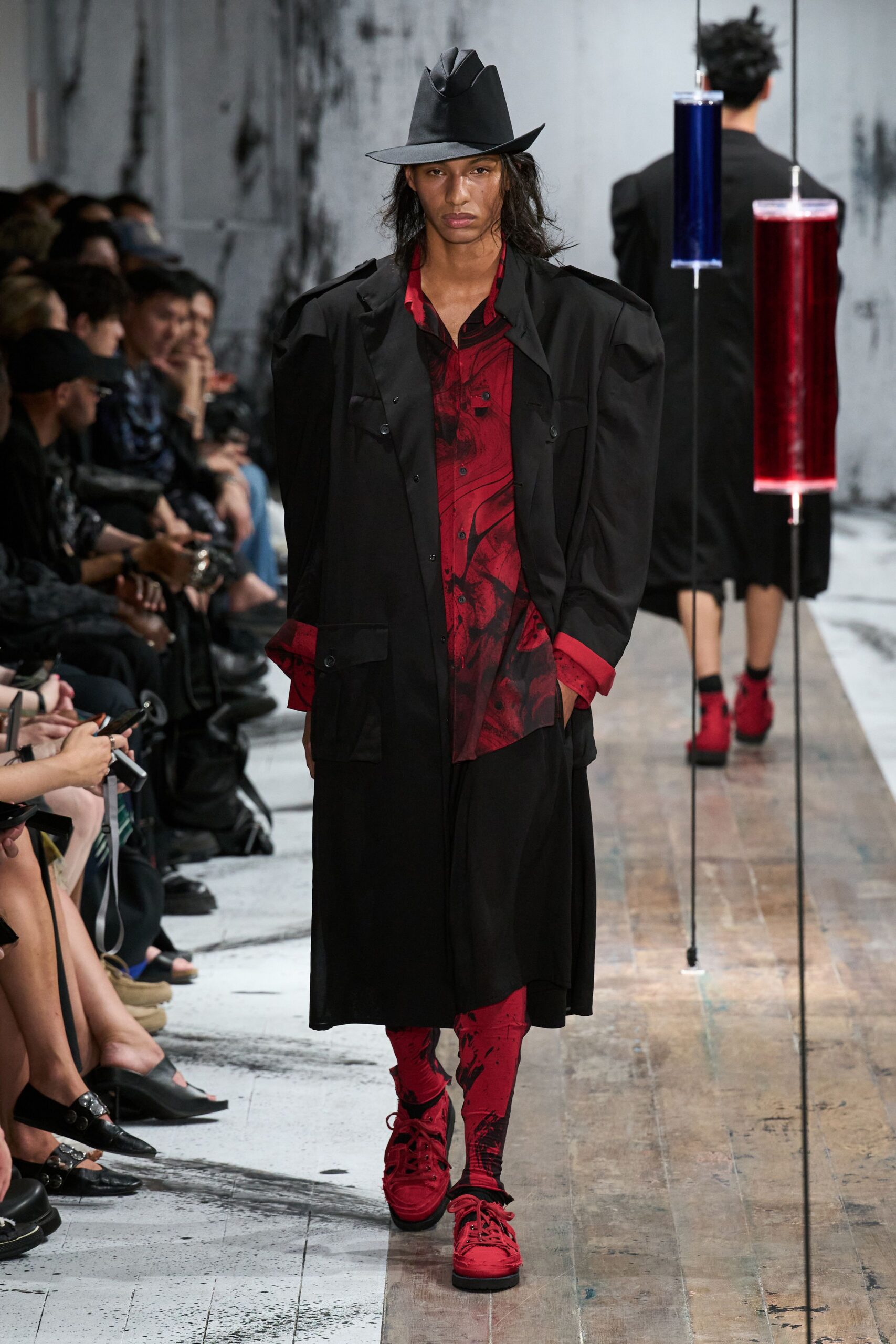 black oversized coat with red shirt