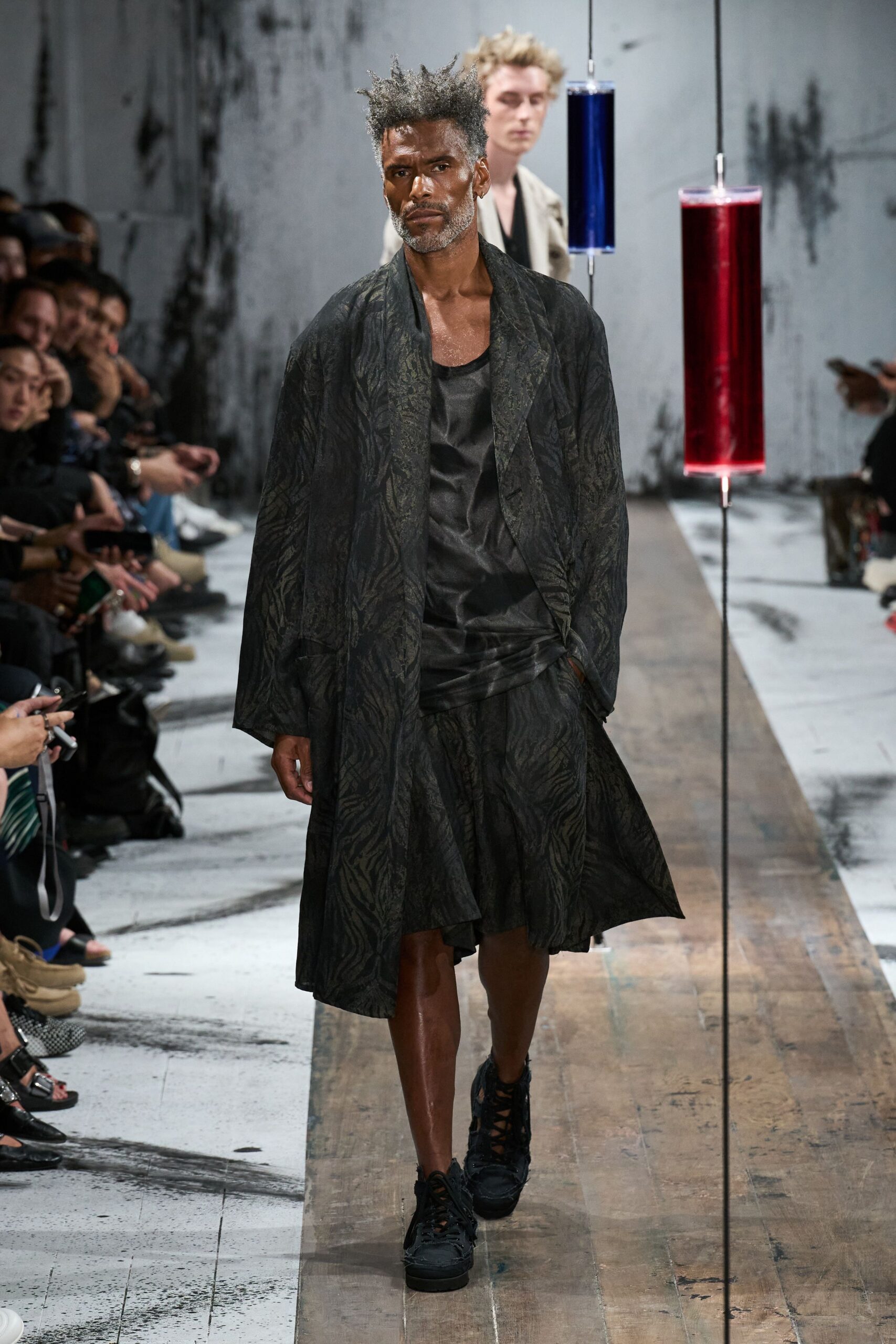 black silk coat with pleated skirt