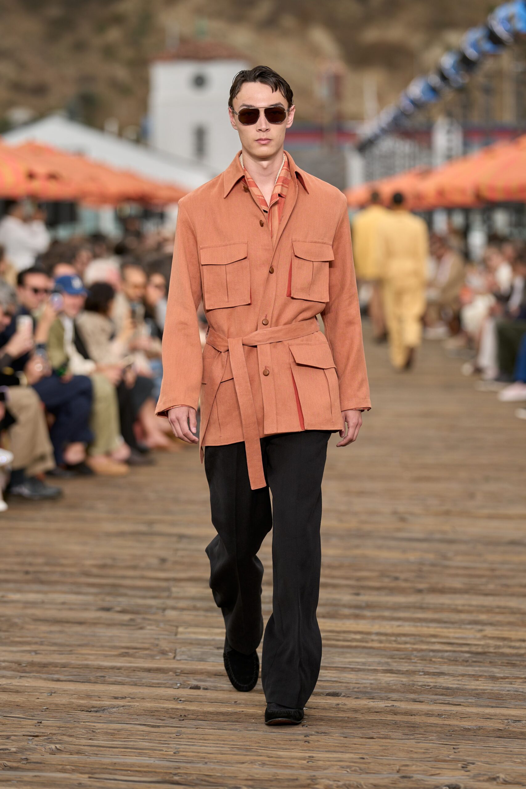 orange relaxed jacket with black pants