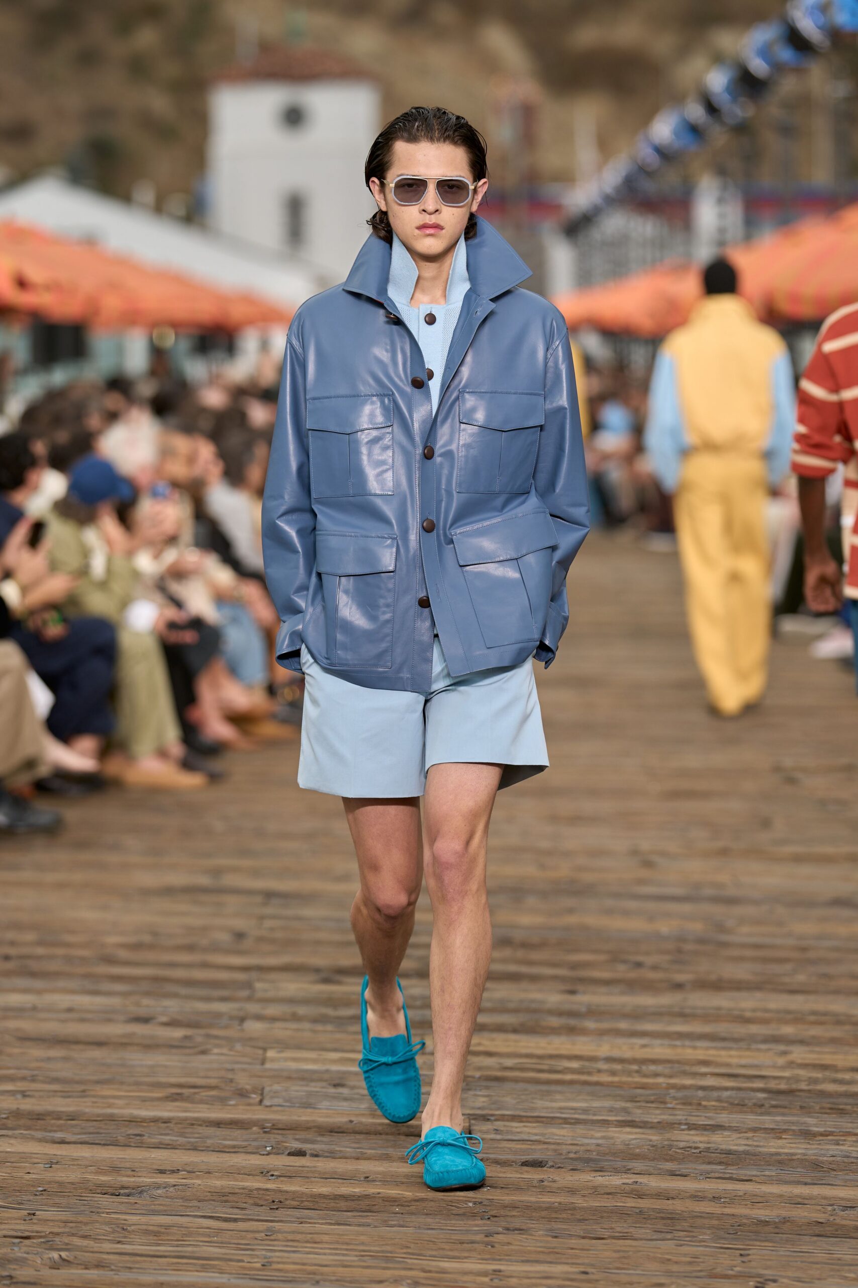 blue vinyl long-sleeve collared relaxed pockets jacket