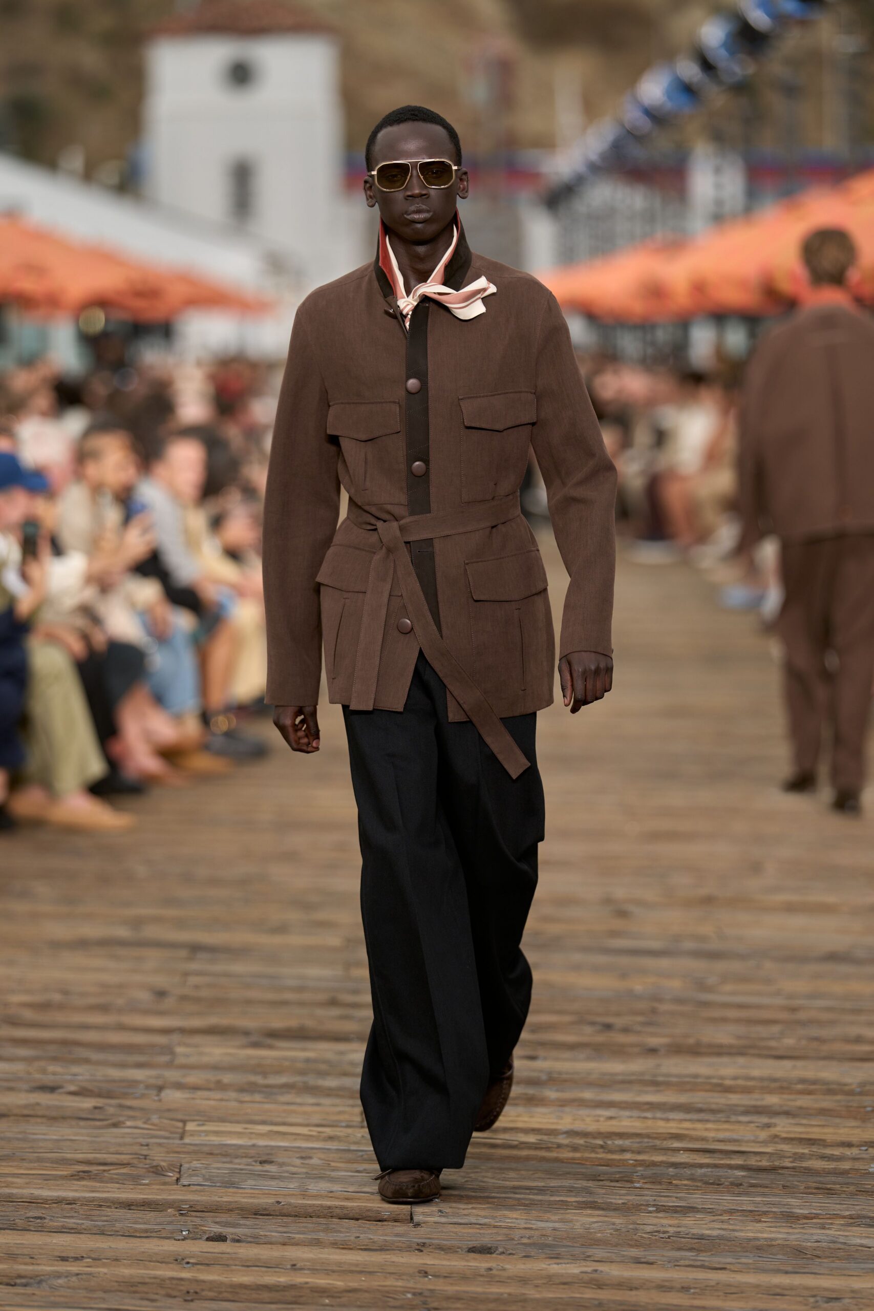 brown structured jacket with black pants