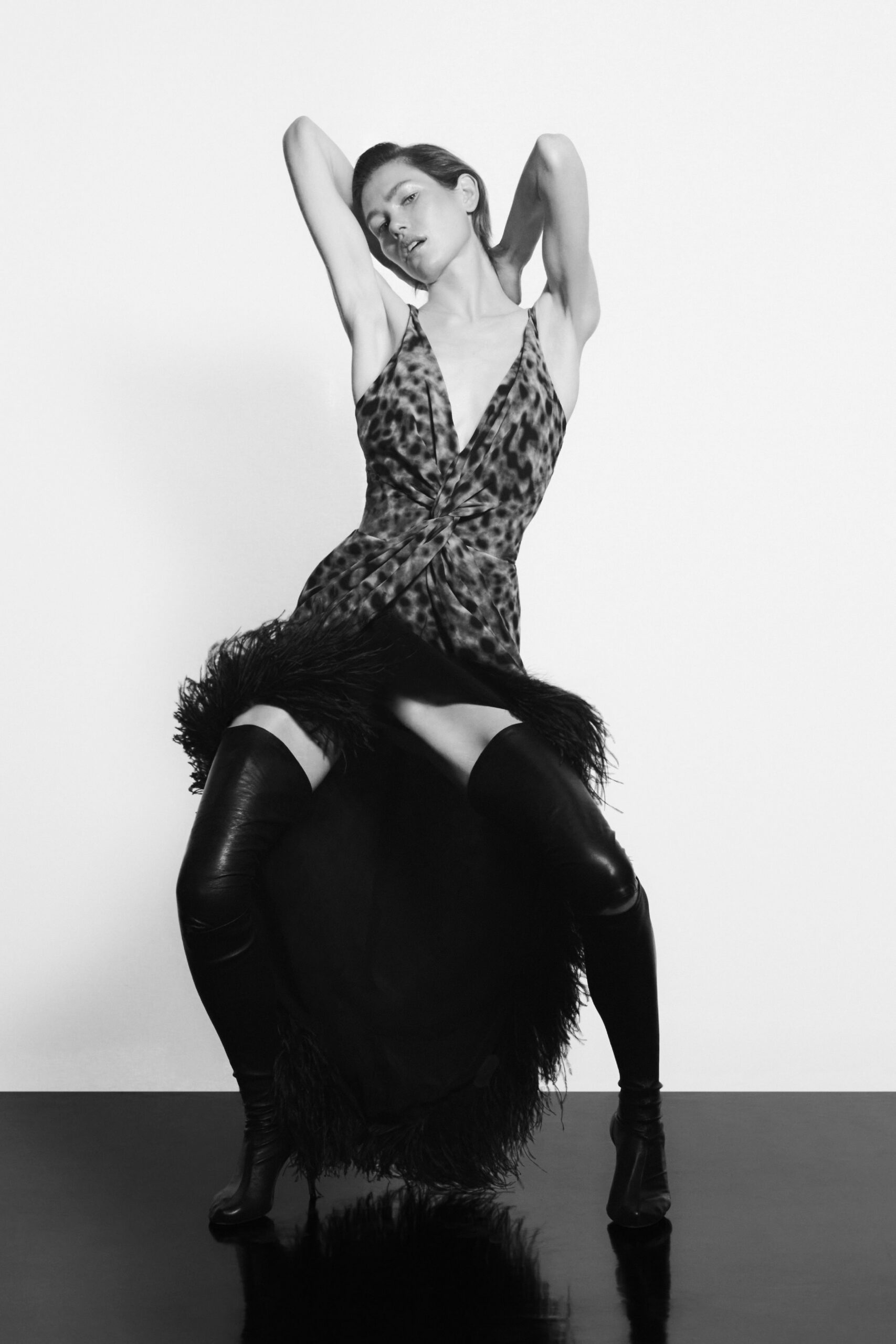 black silk sleeveless v-neck fitted animal-print flared dress
