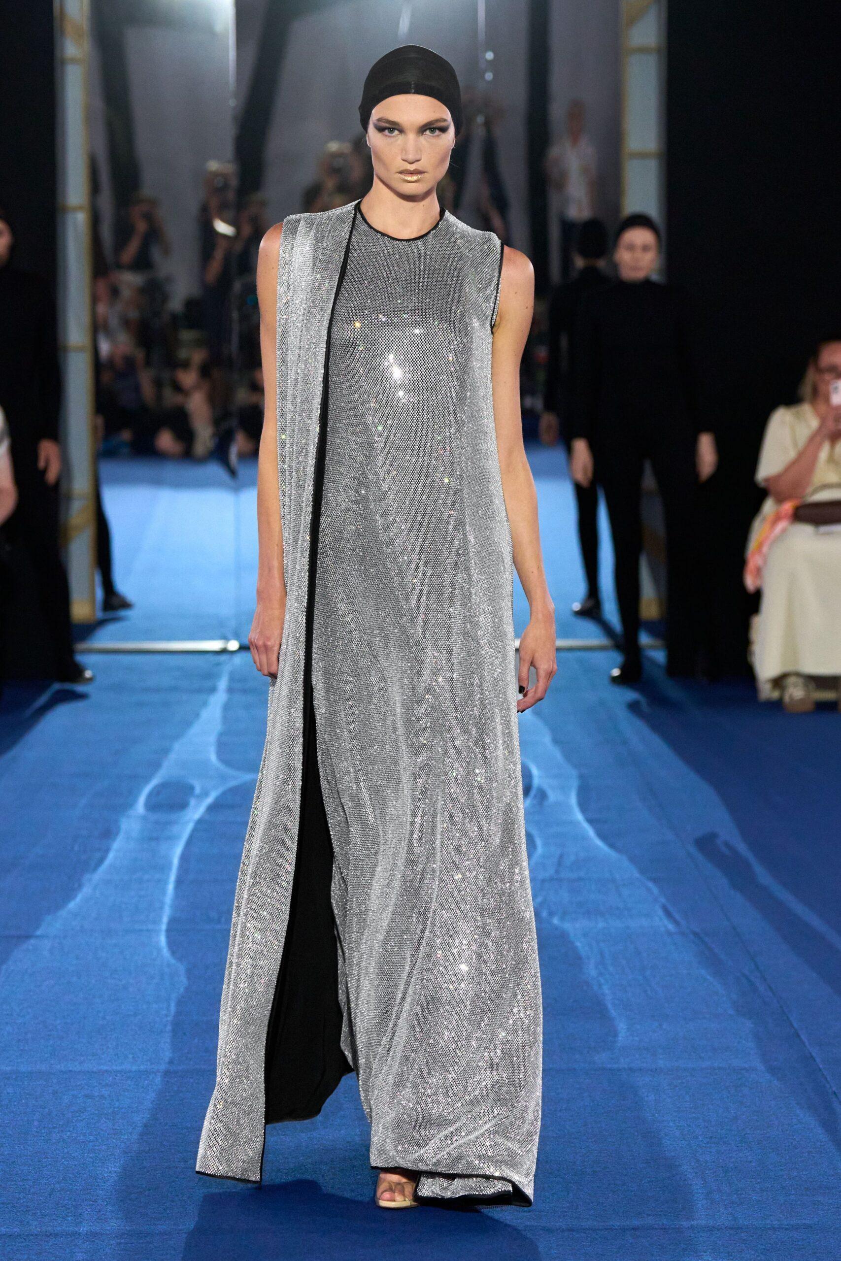 shiny silver sleeveless gown