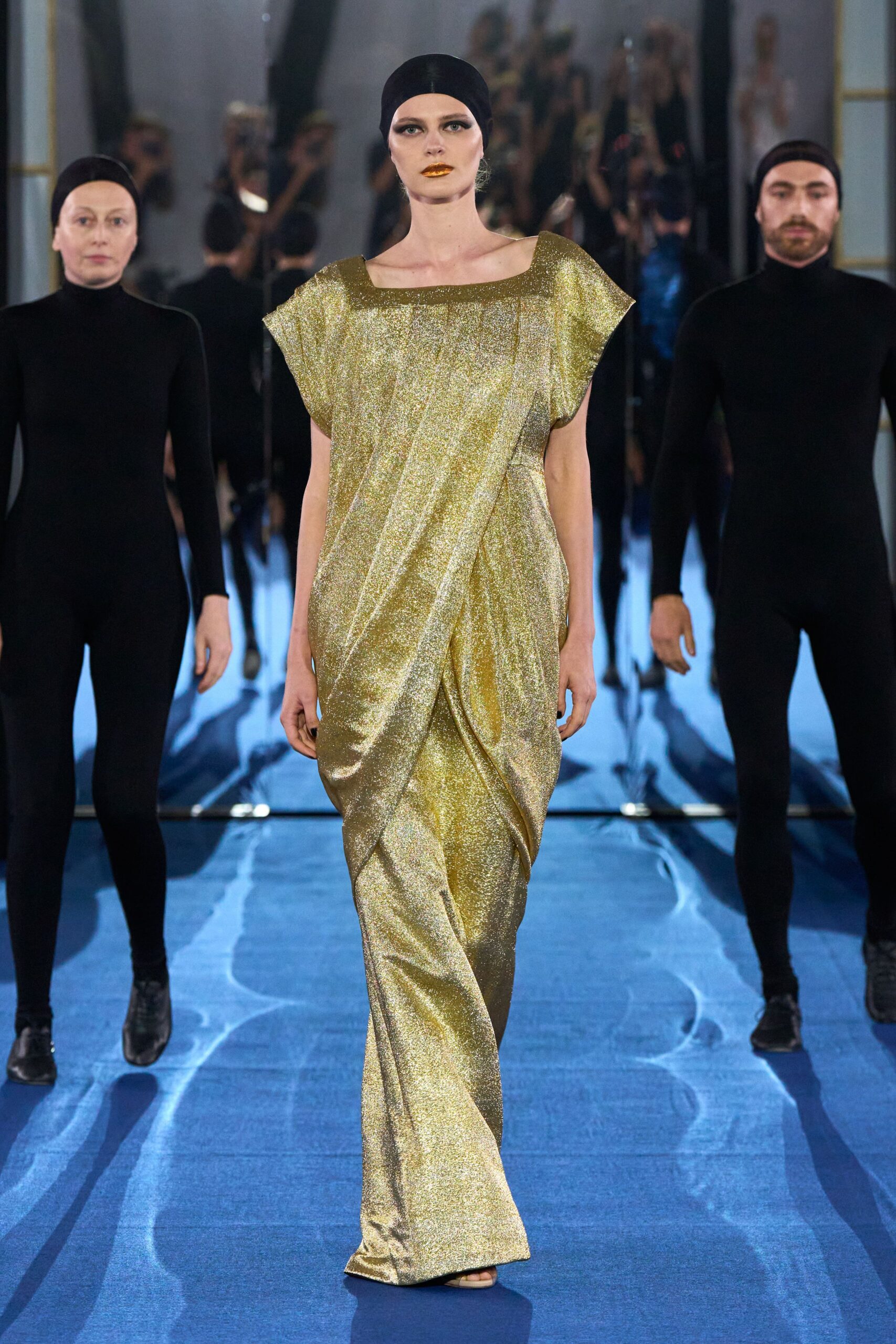 gold shiny sleeveless gown