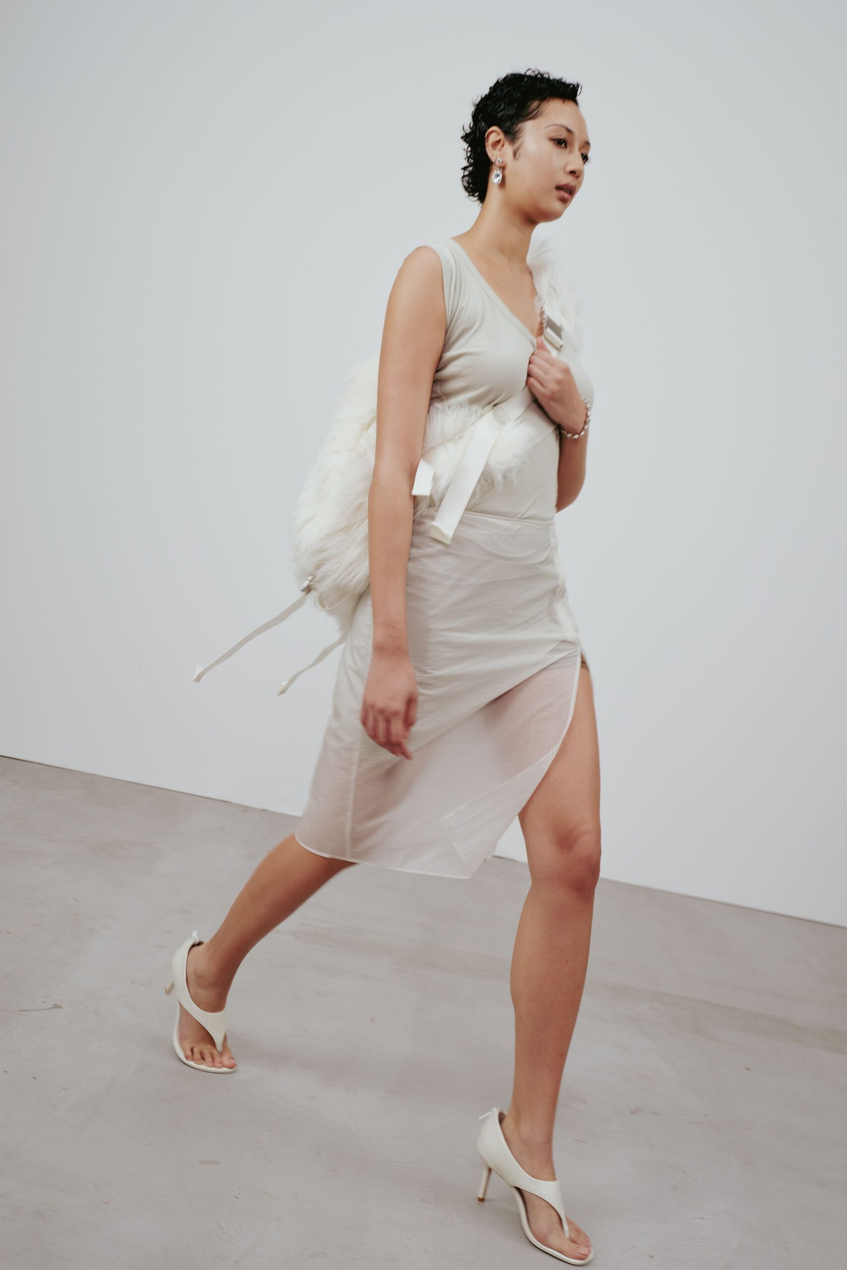 beige midi dress with white cape