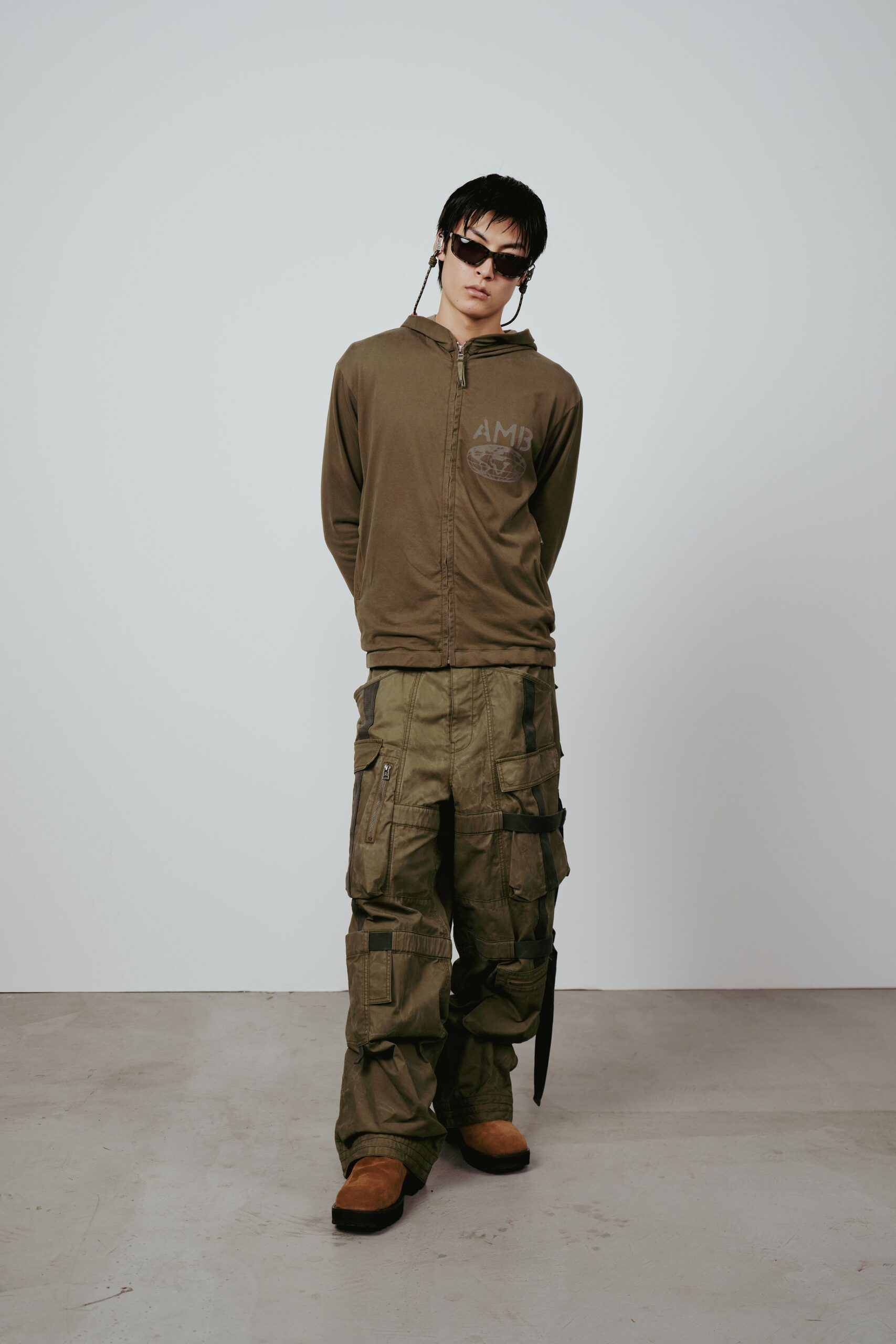 green relaxed hoodie with cargo pants
