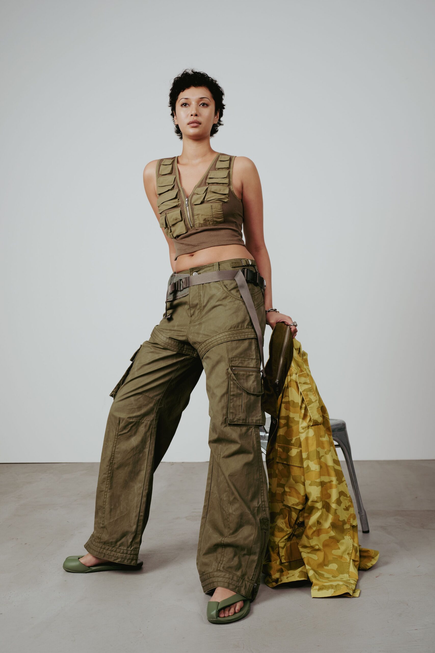 beige fitted top green cargo pants