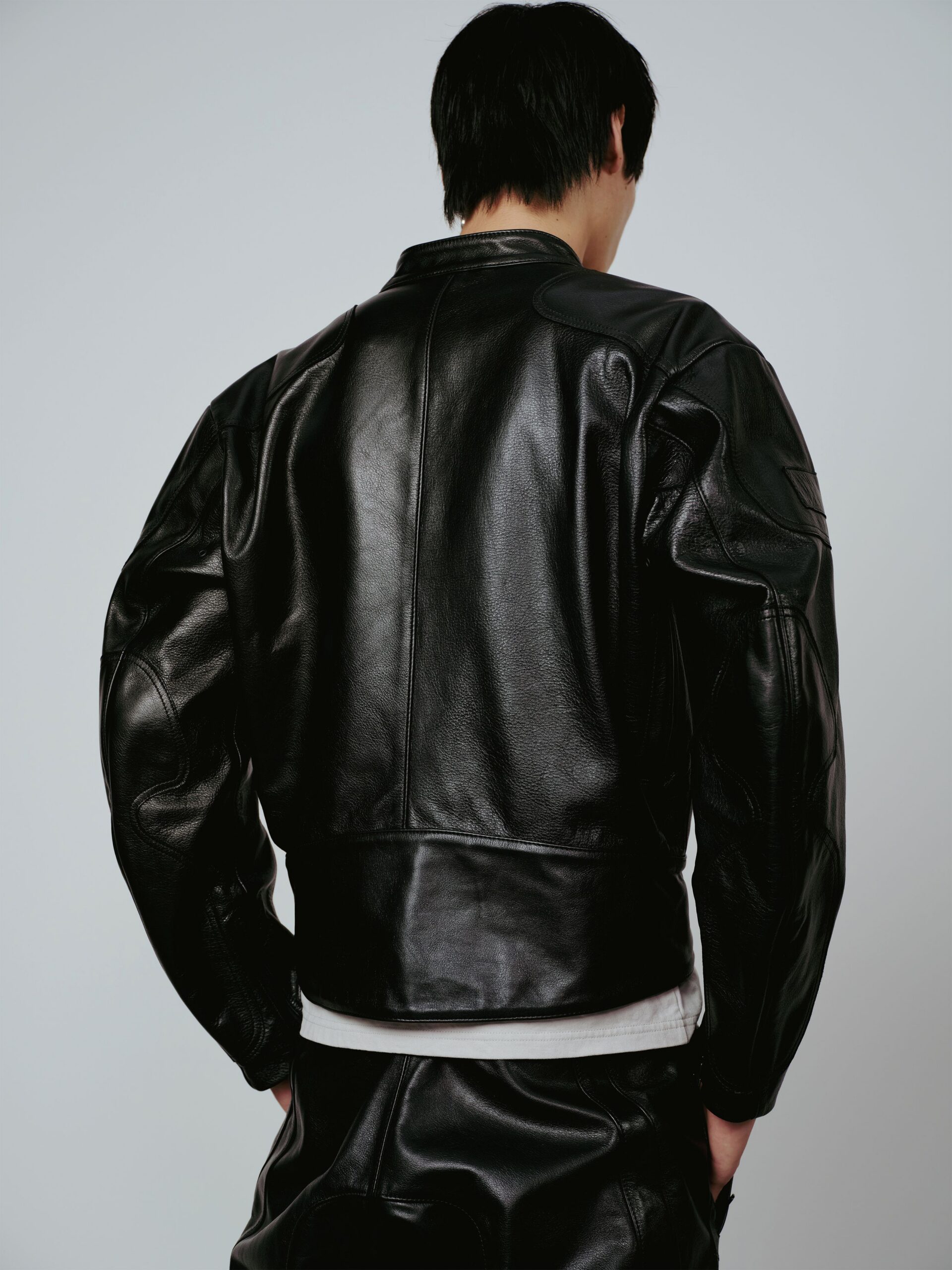 black leather fitted jacket and white shirt
