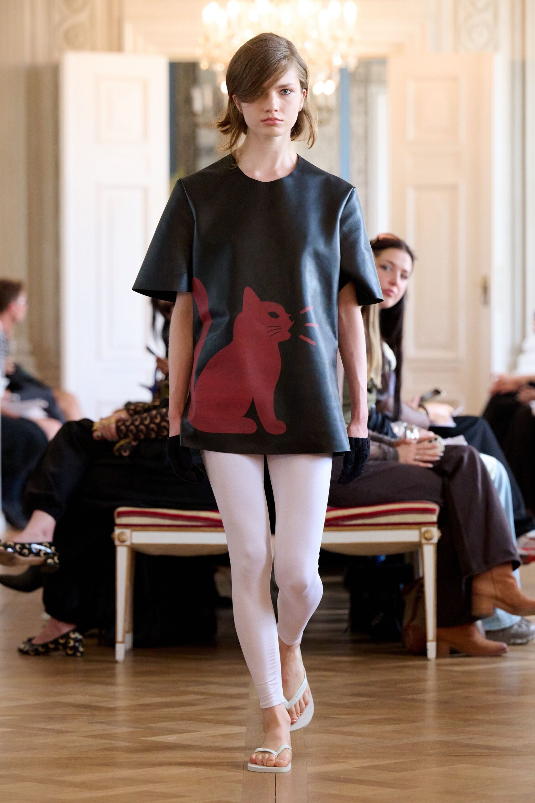 black leather short-sleeve collared relaxed printed top