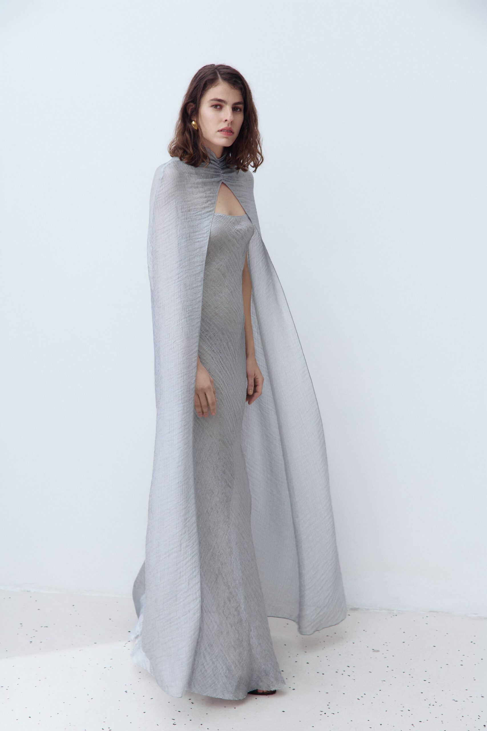 gray silk sleeveless high-neck fitted layered flowing gown