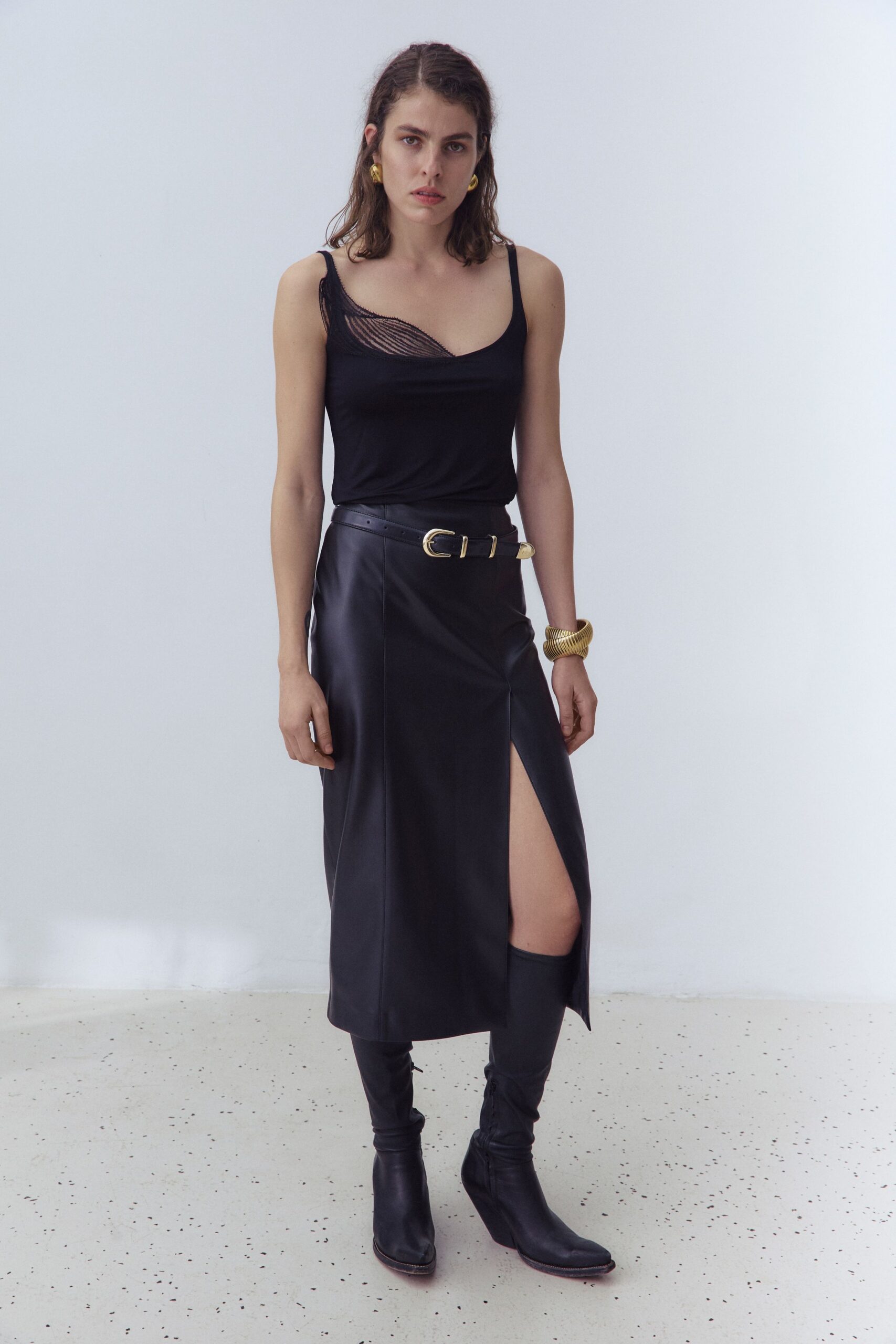 black tank-top and leather skirt