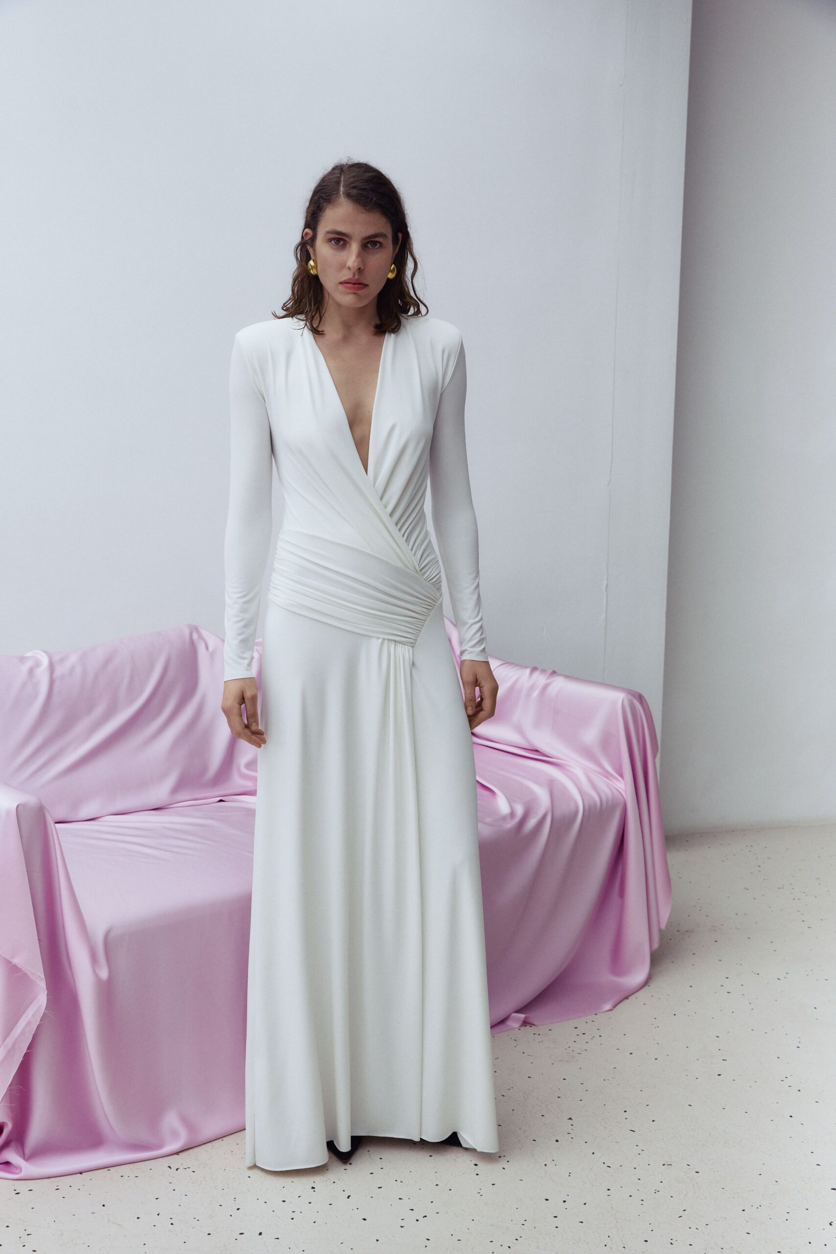 fitted white long-sleeve gown