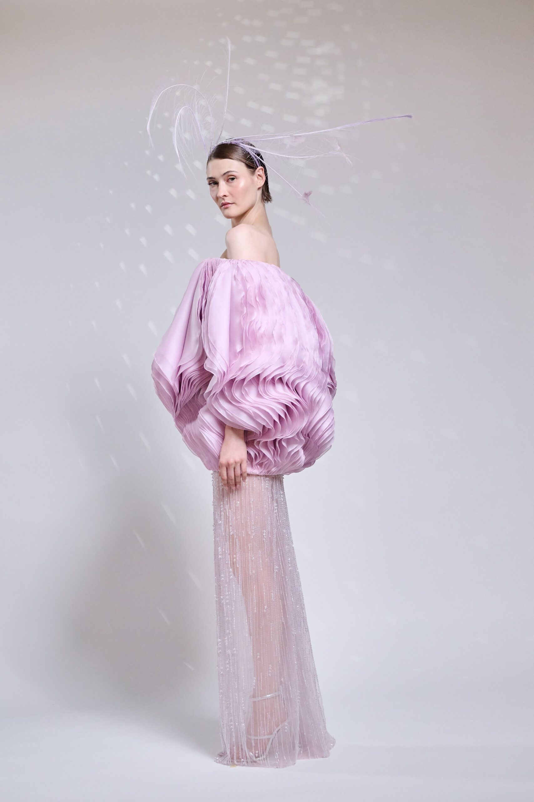 pink pleated off-shoulder gown