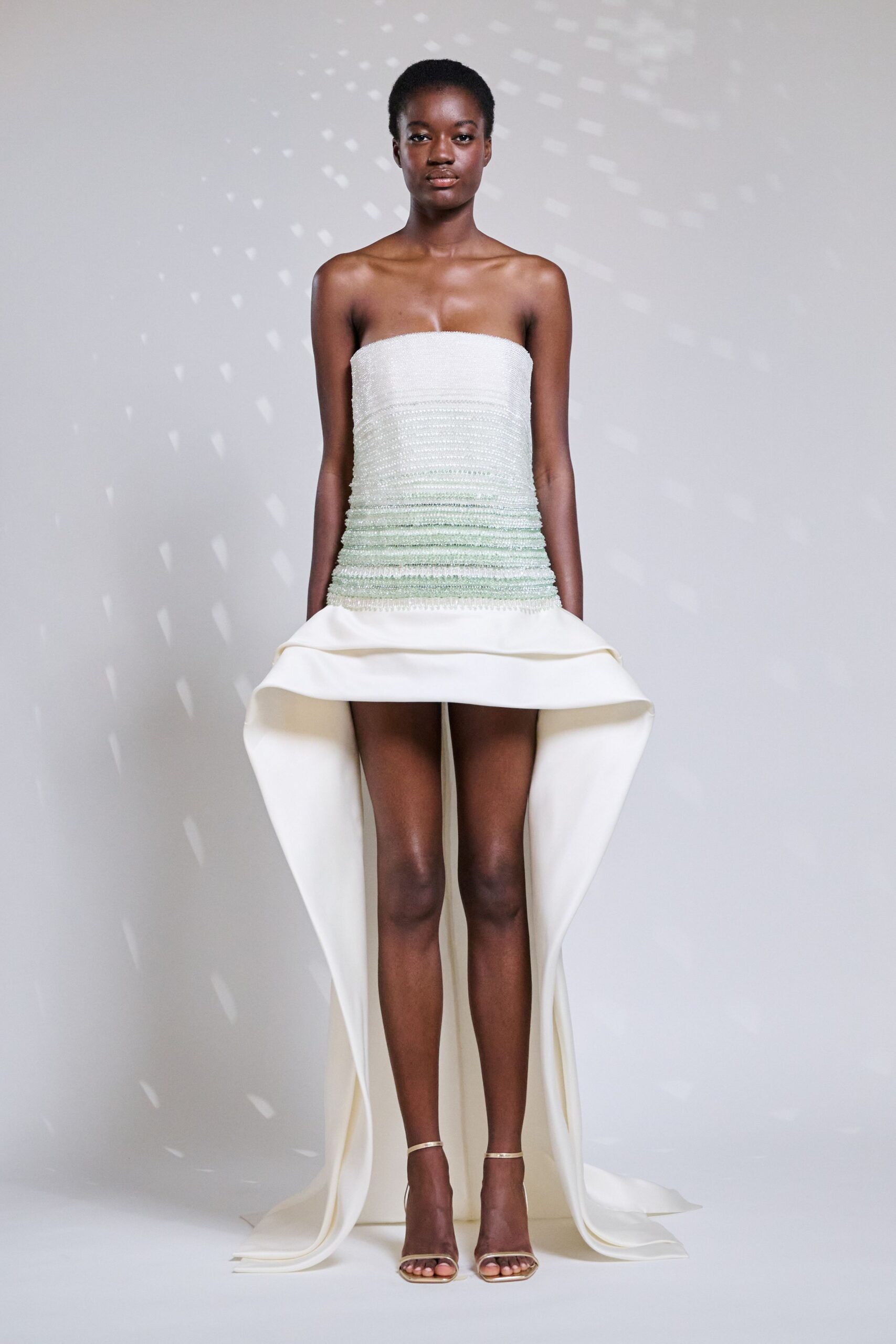 white silk strapless fitted ruched layered mini dress