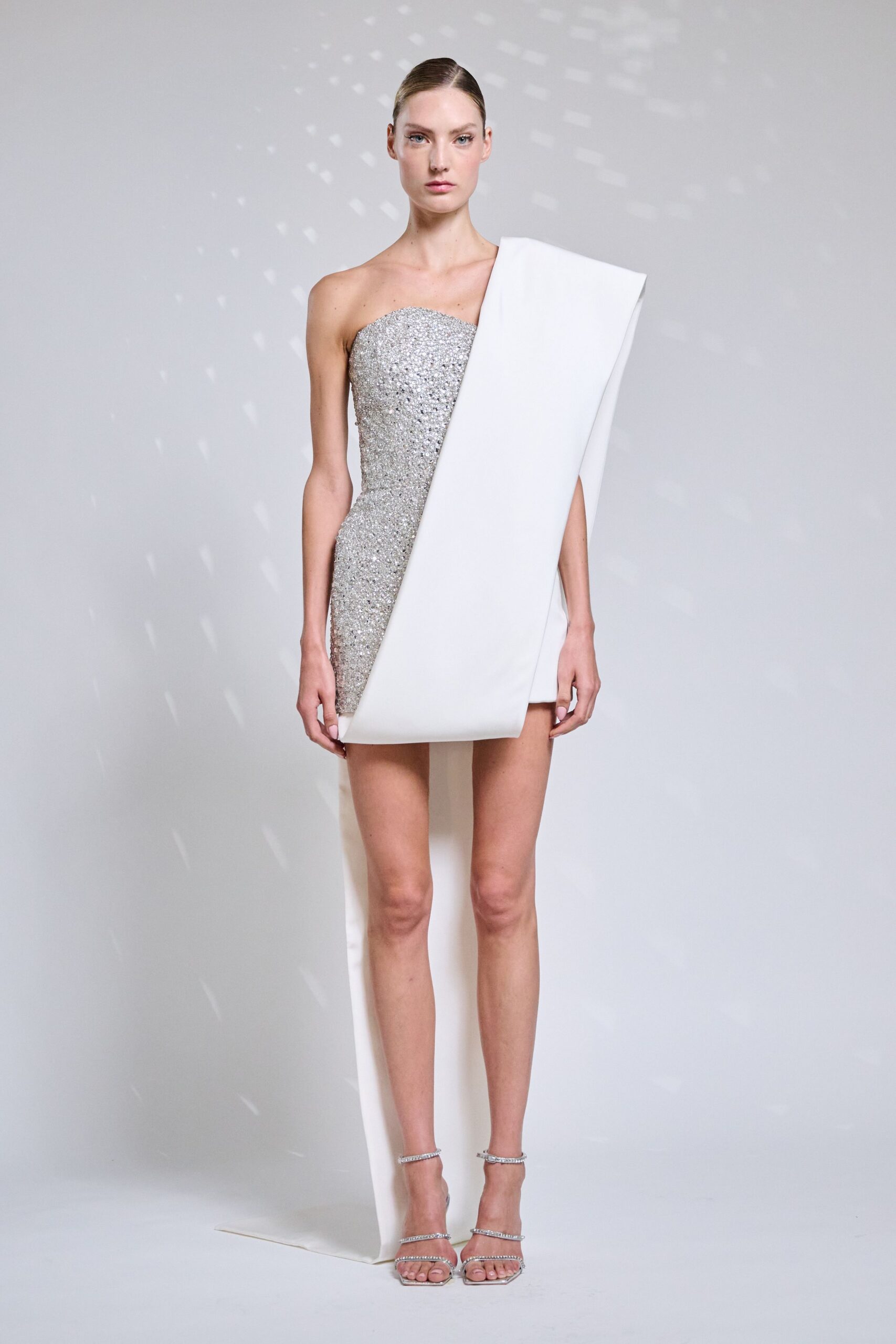 white sequin sleeveless off-shoulder fitted draped shiny dress