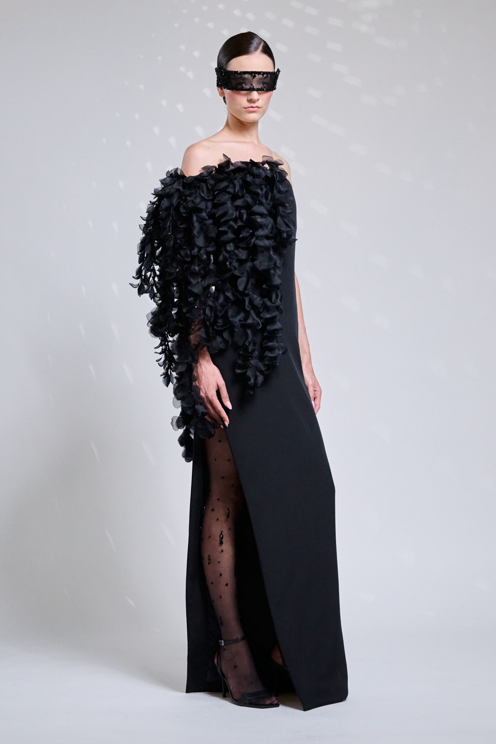 black silk off-shoulder slit fitted ruffled maxi gown