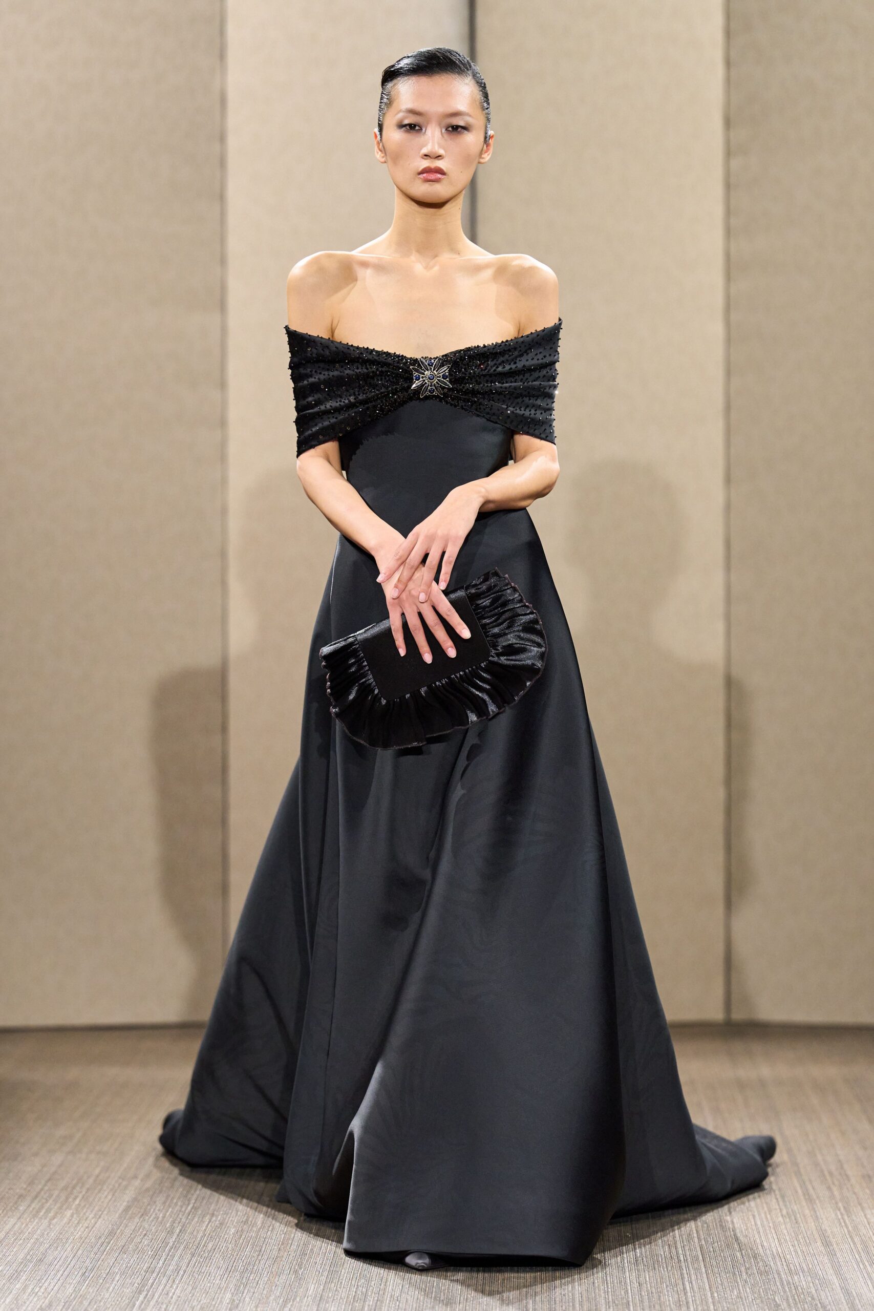 black silk off-shoulder fitted pleated flowing maxi gown