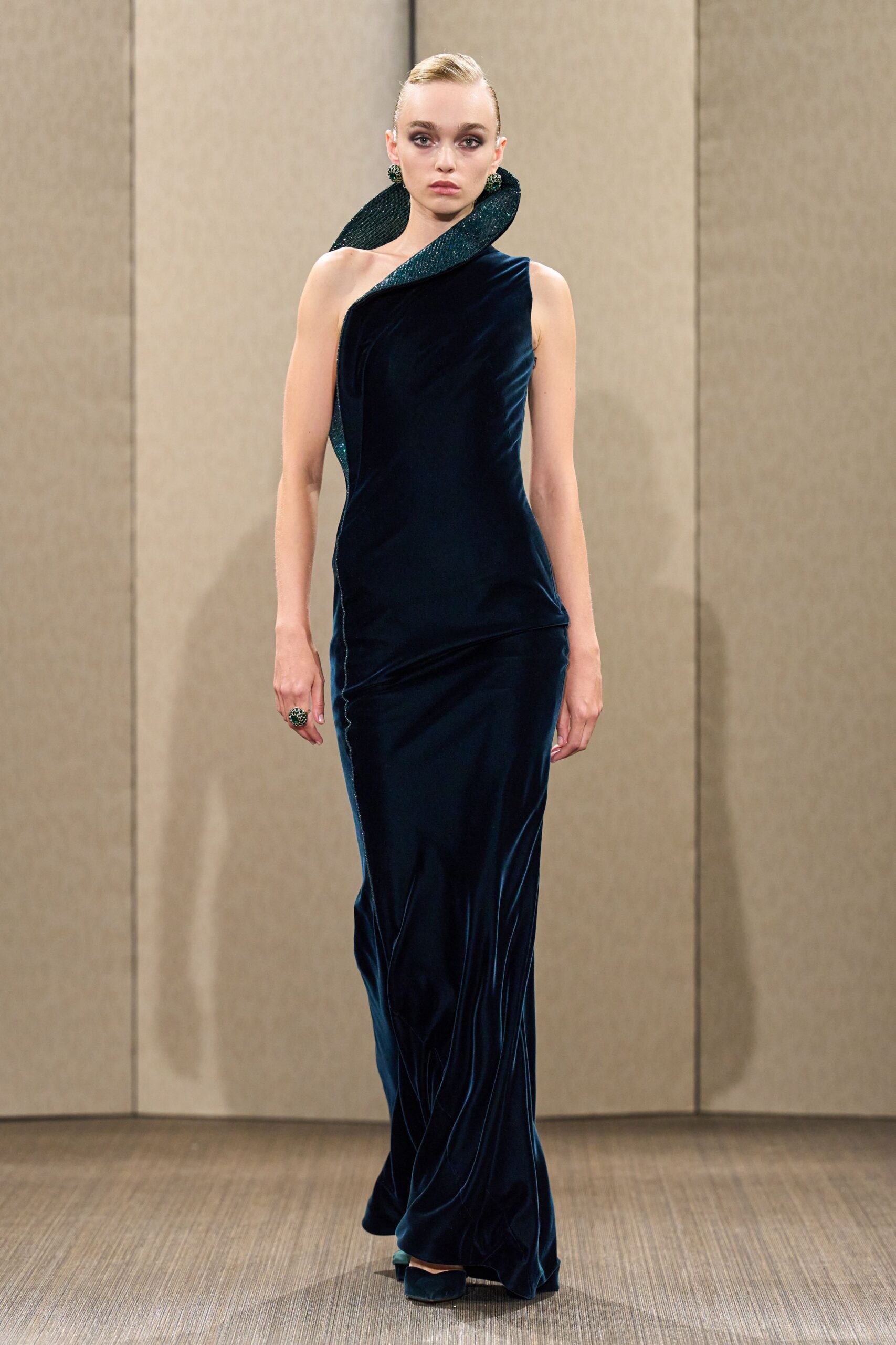 blue velvet sleeveless high-neck fitted draped flowing gown