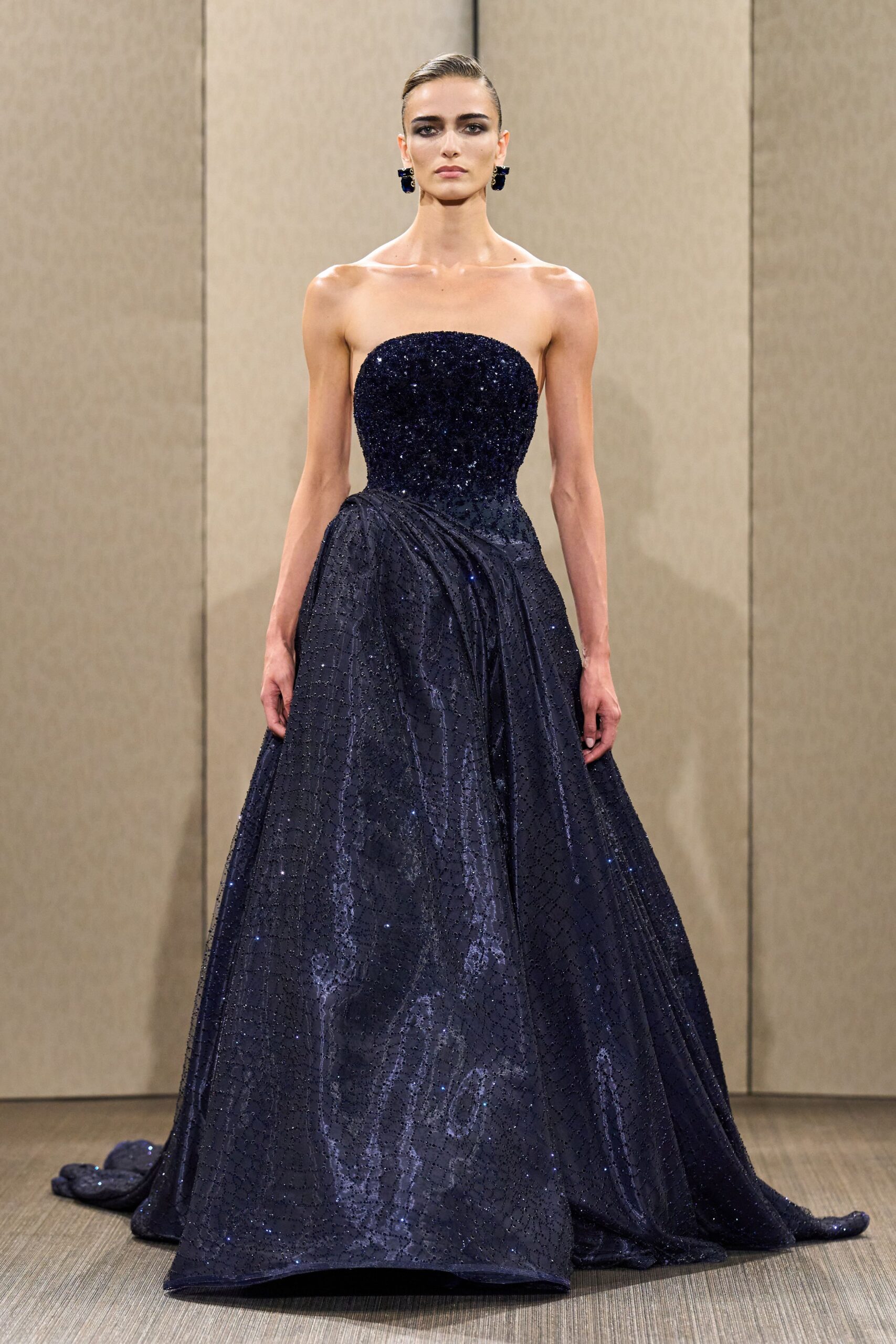 black sequined strapless gown