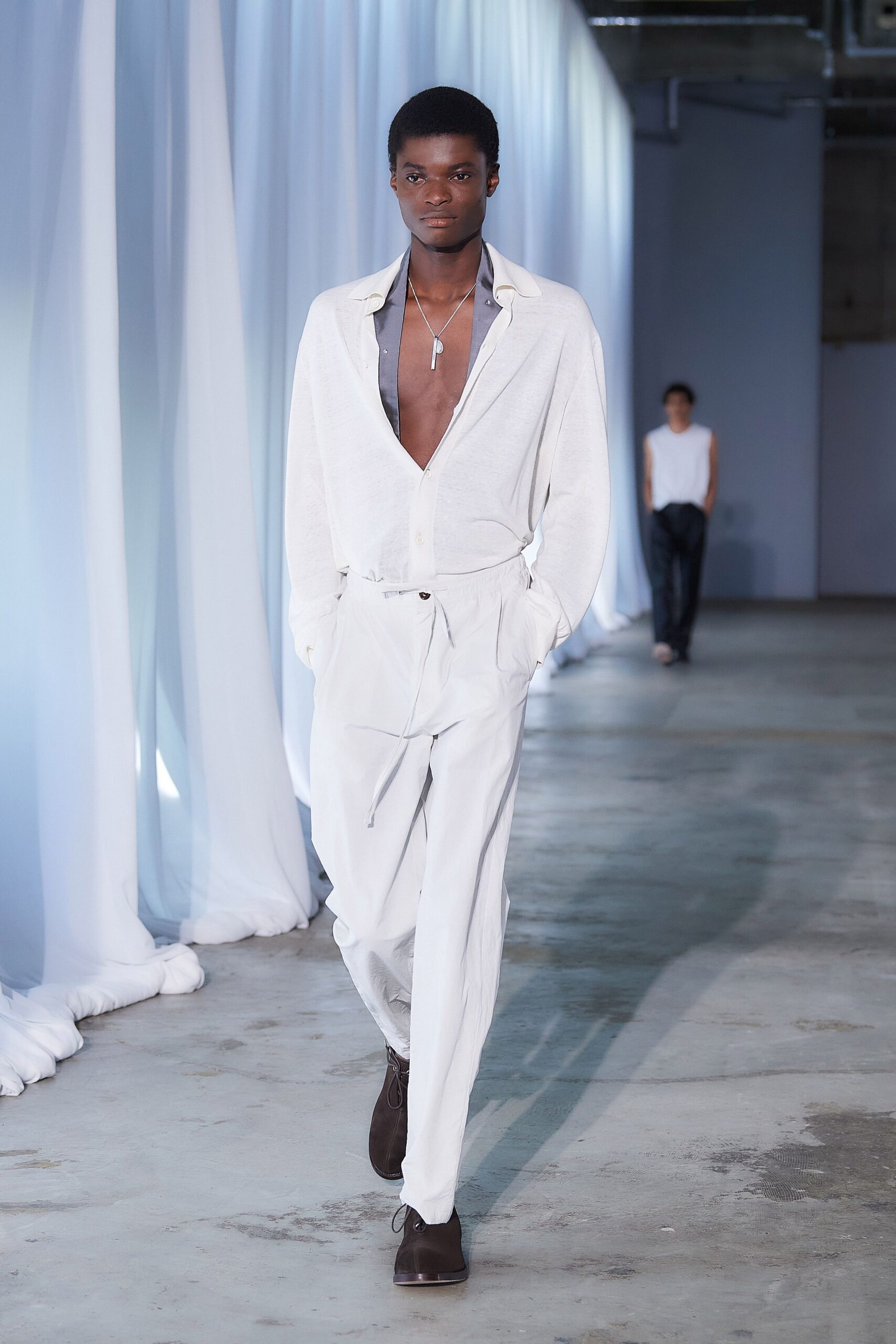 white relaxed shirt and pants