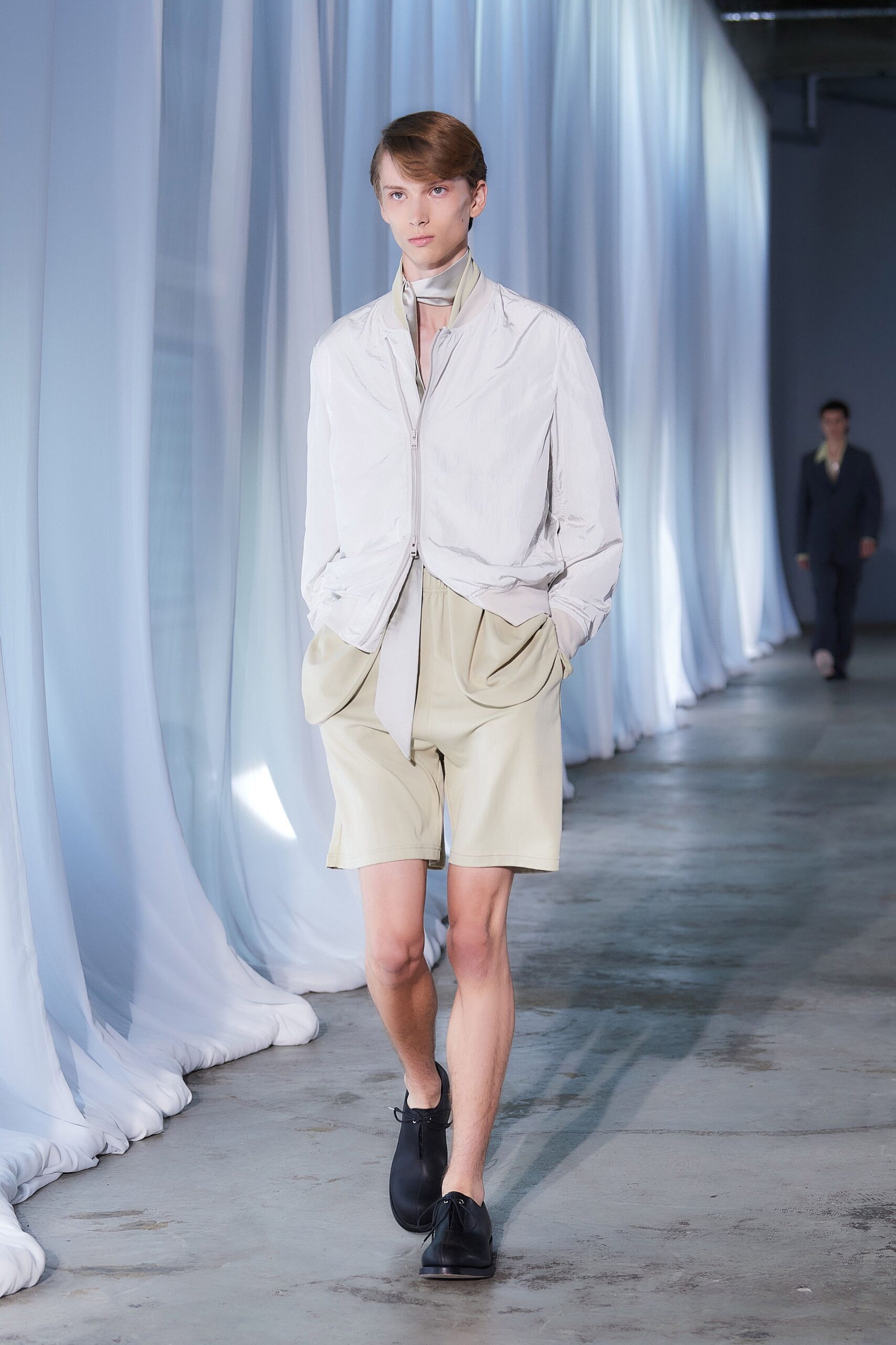 white relaxed shirt beige shorts