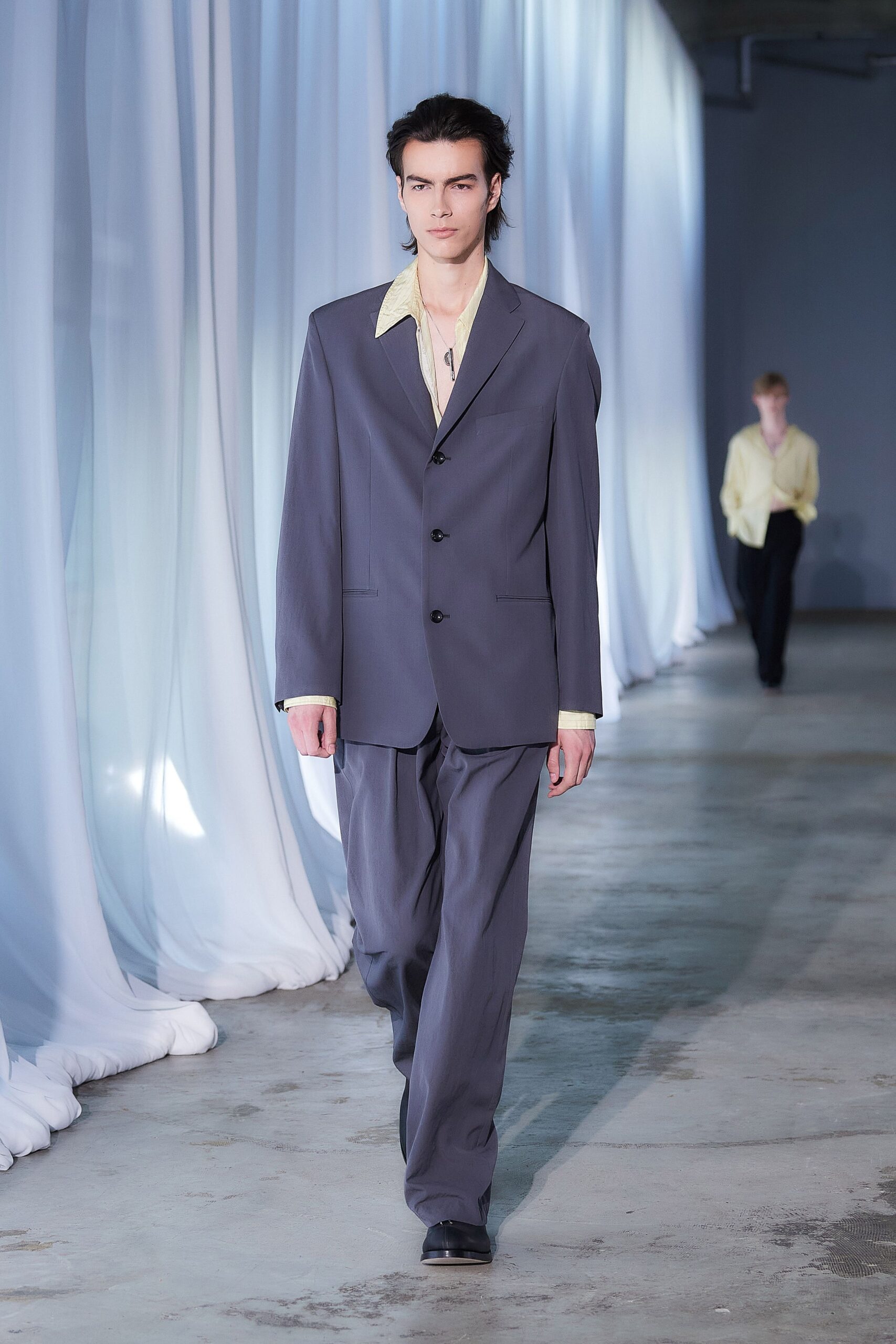 gray tailored suit with yellow shirt