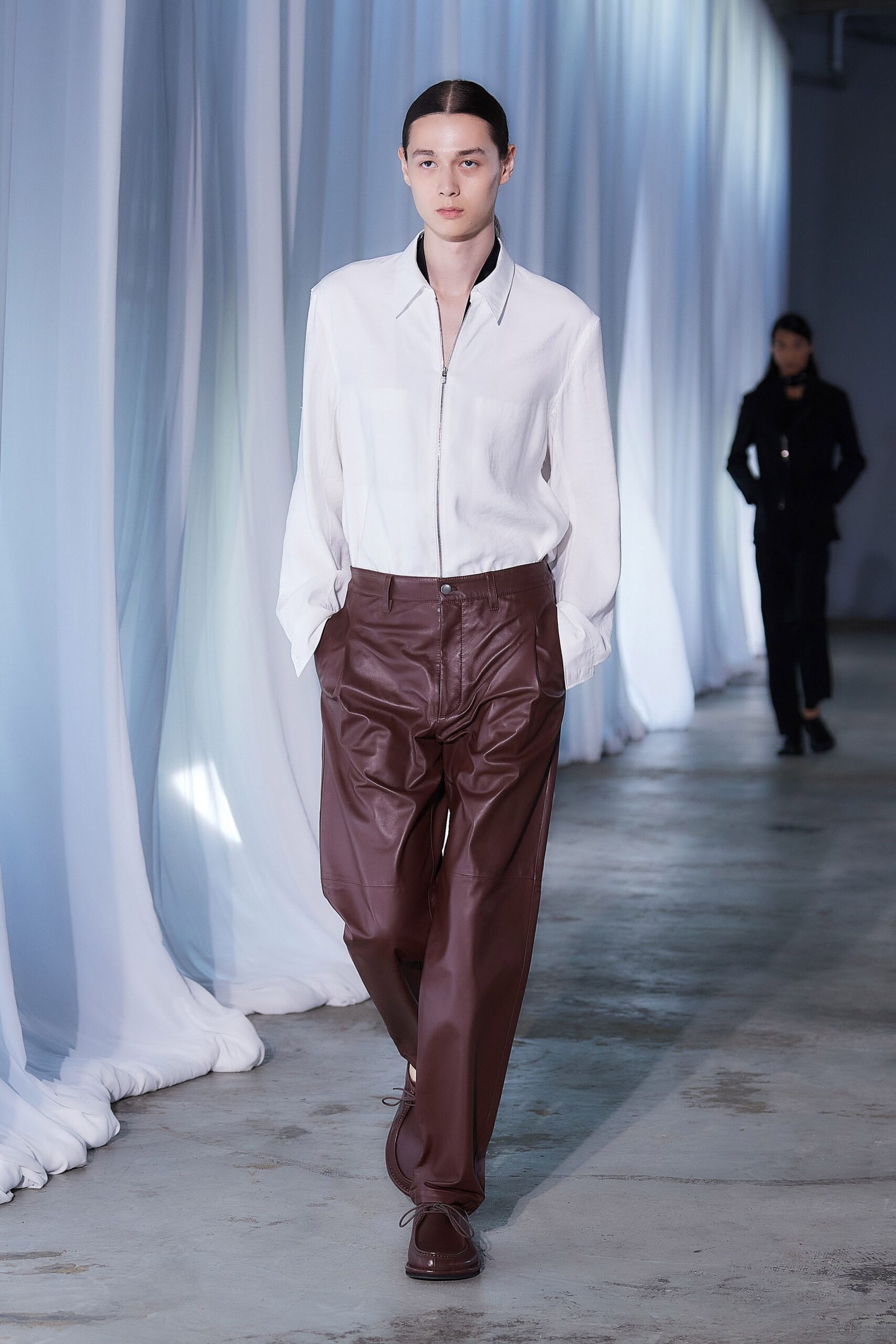 white silk shirt and brown leather pants