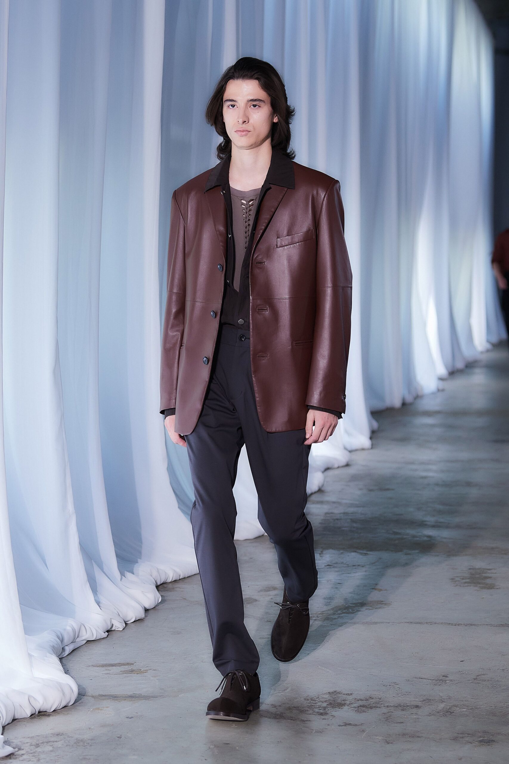 brown leather blazer with black top