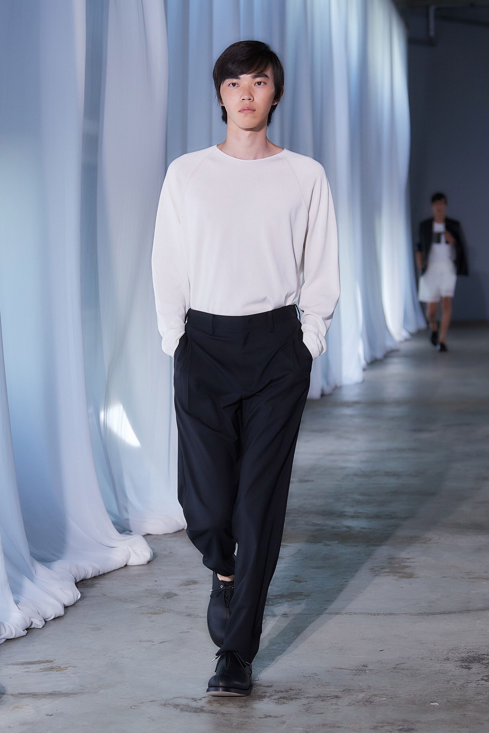 white relaxed shirt black tailored pants