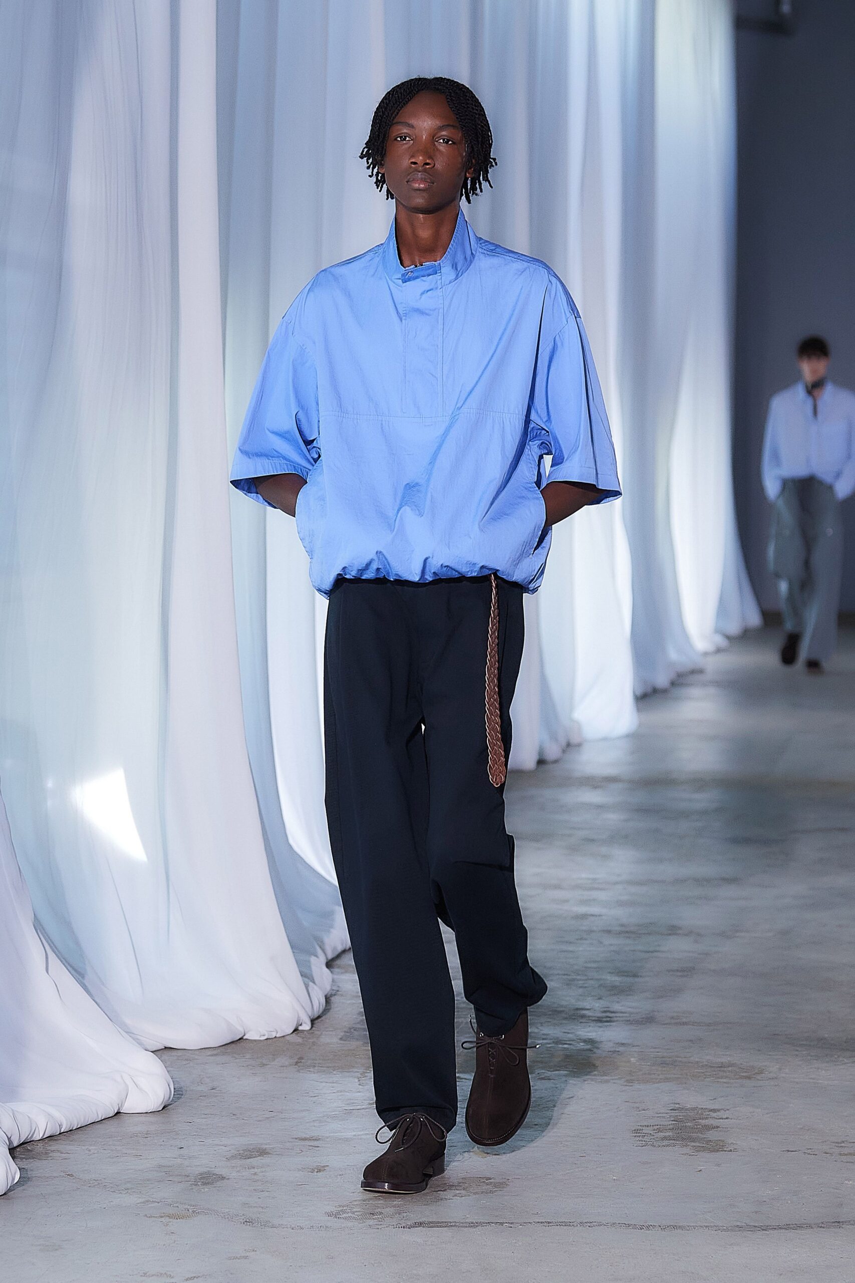 blue relaxed shirt with black pants