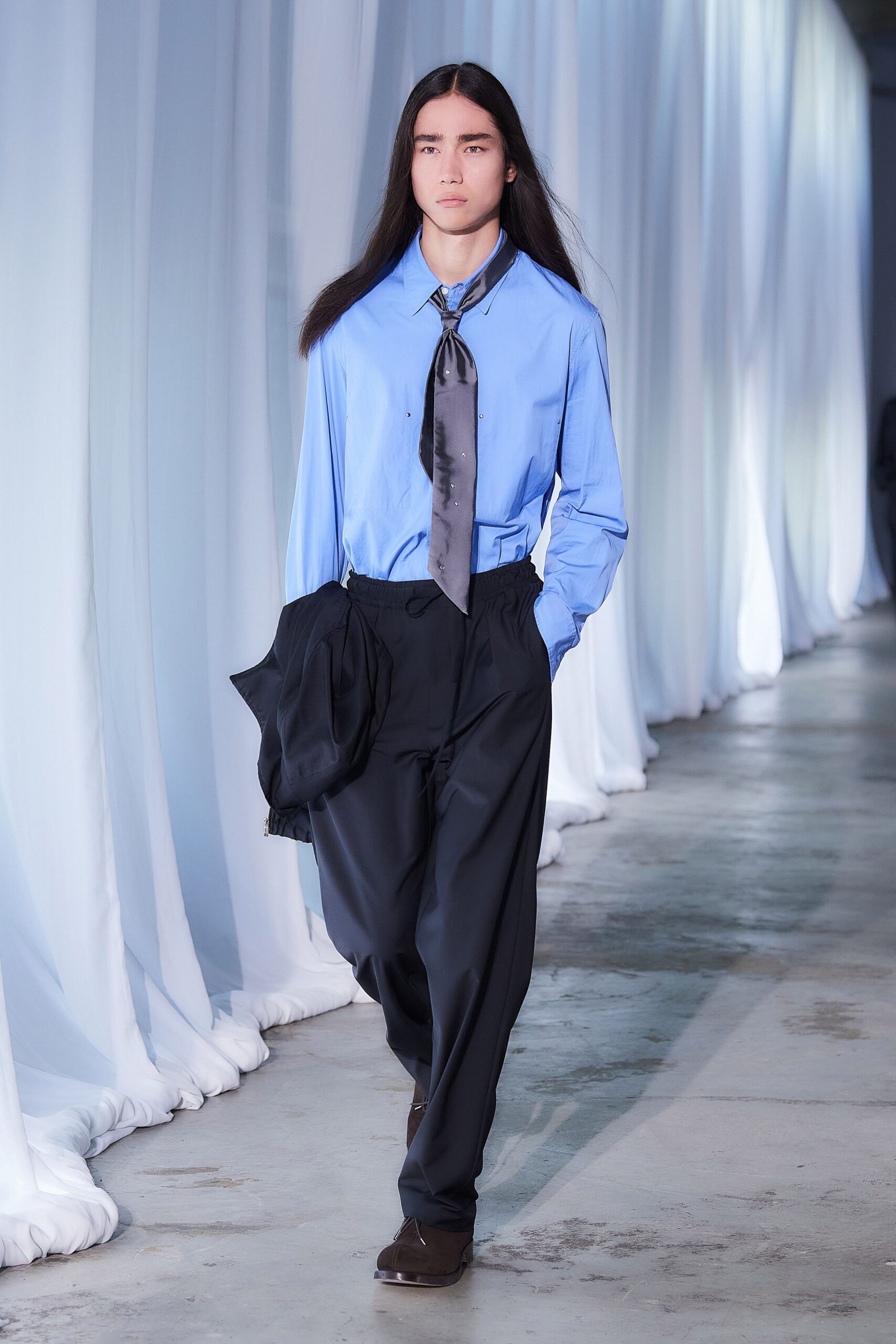 blue cotton shirt with black pants