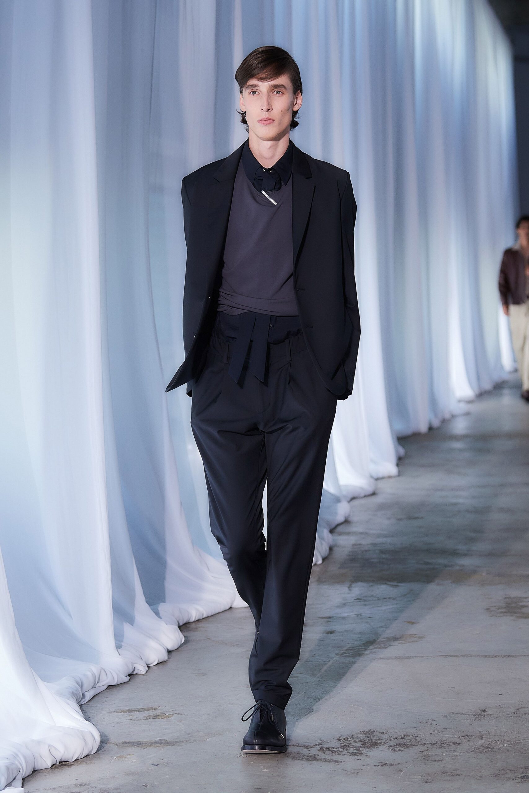 black tailored suit with gray shirt