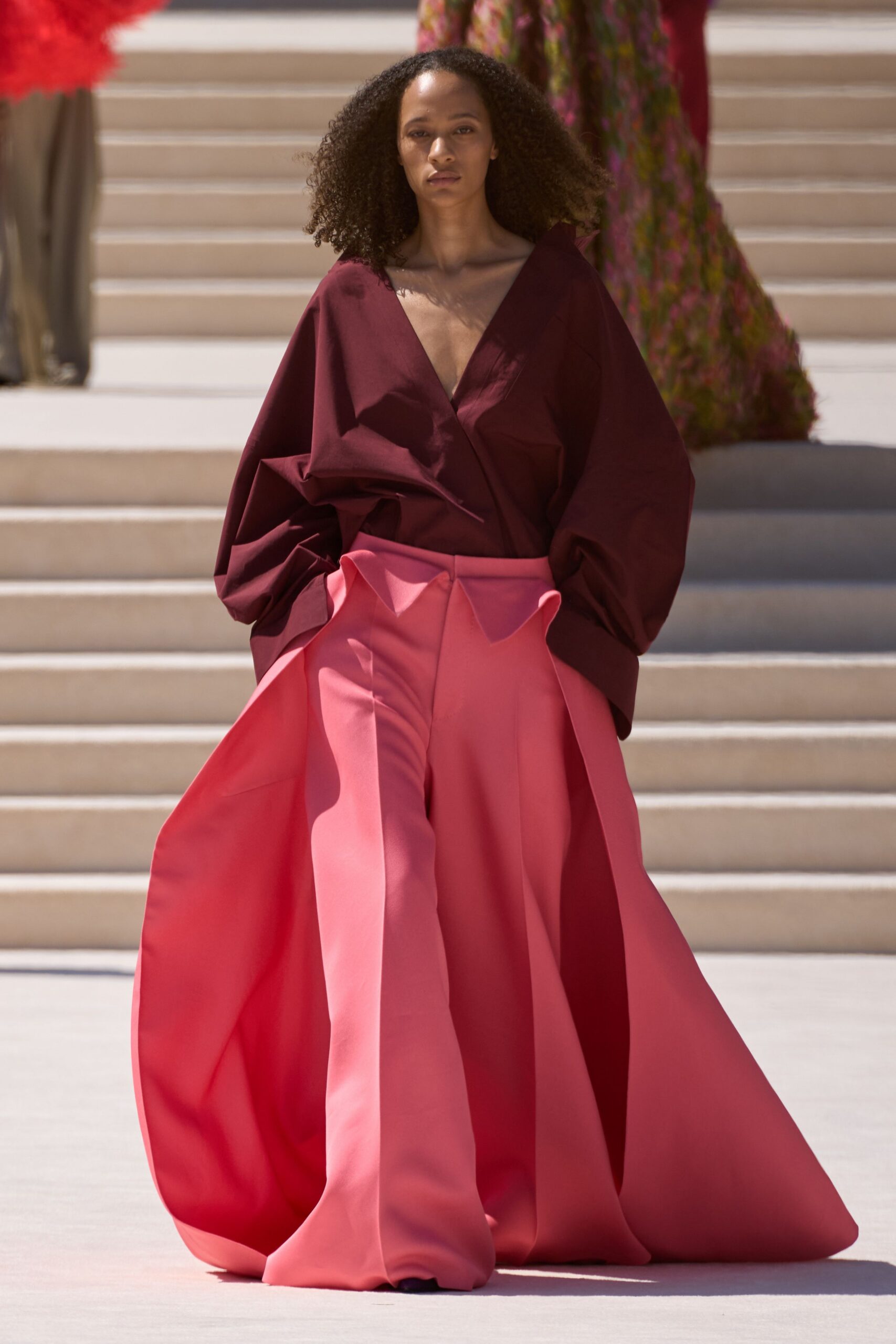 maroon long-sleeve v-neck relaxed draped top