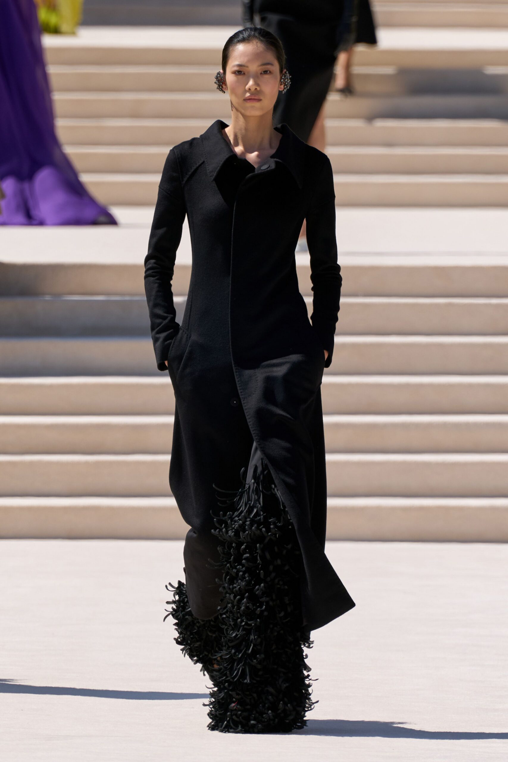 black wool long-sleeve collared fitted buttoned pockets coat