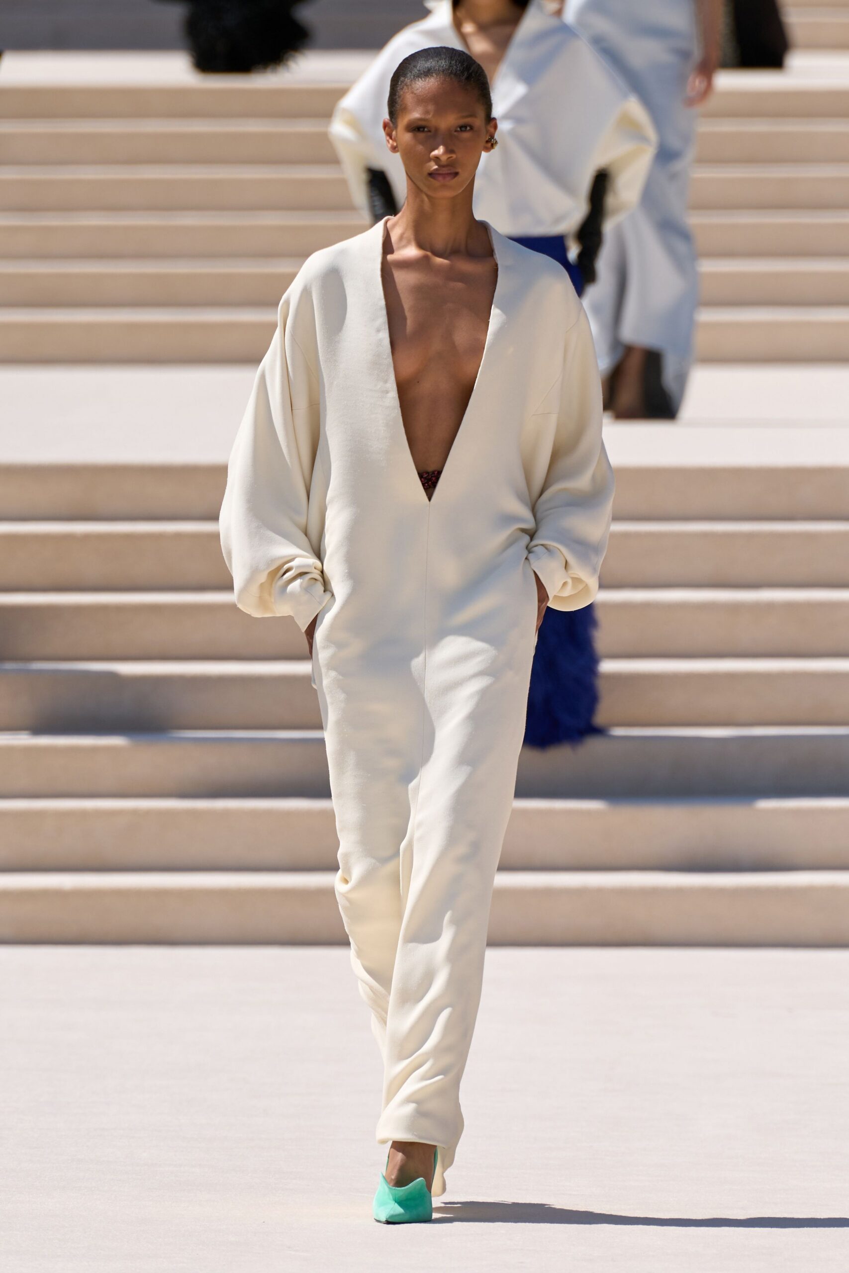 white cotton long-sleeve v-neck relaxed jumpsuit