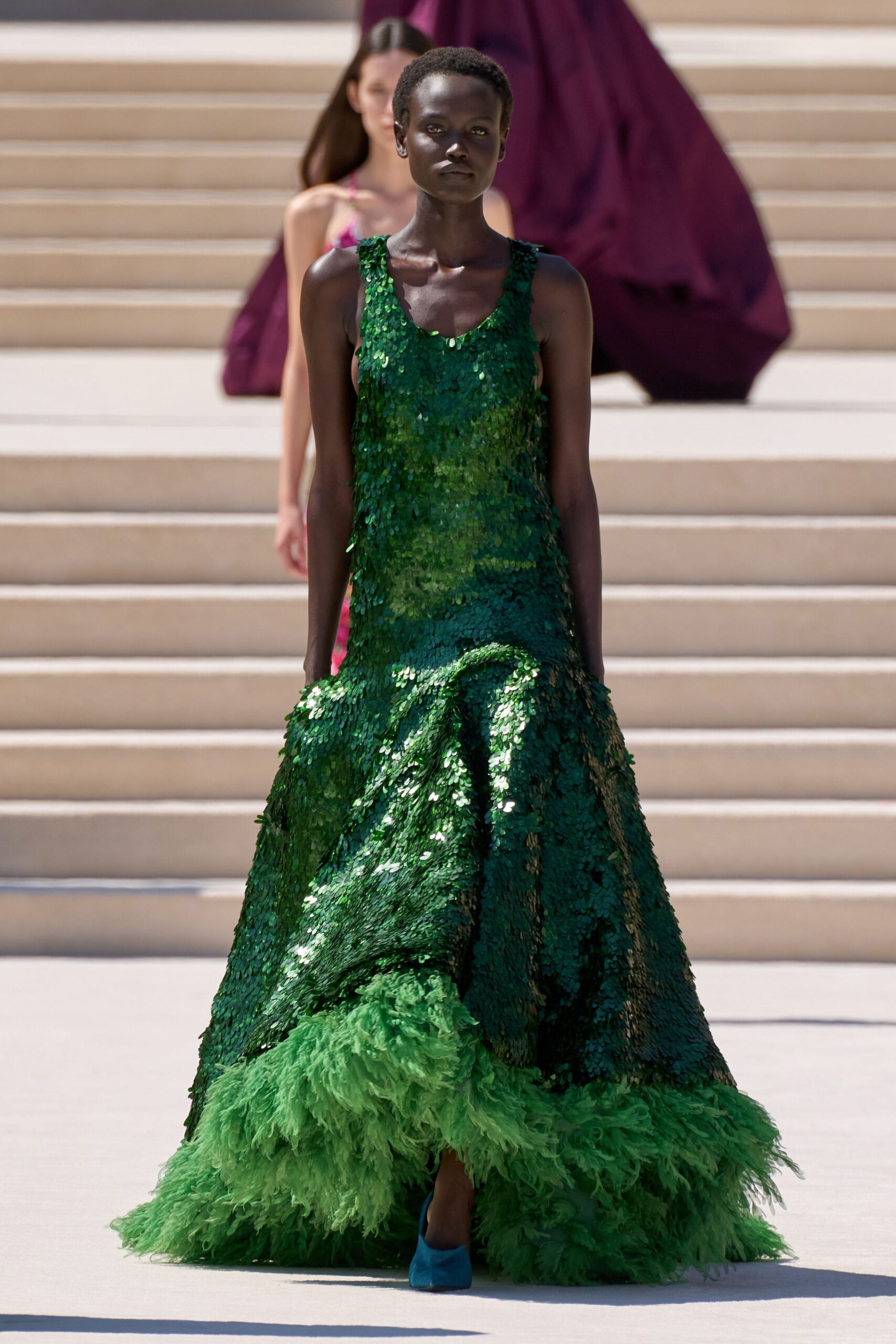 green feather sleeveless v-neck fitted sequined layered gown