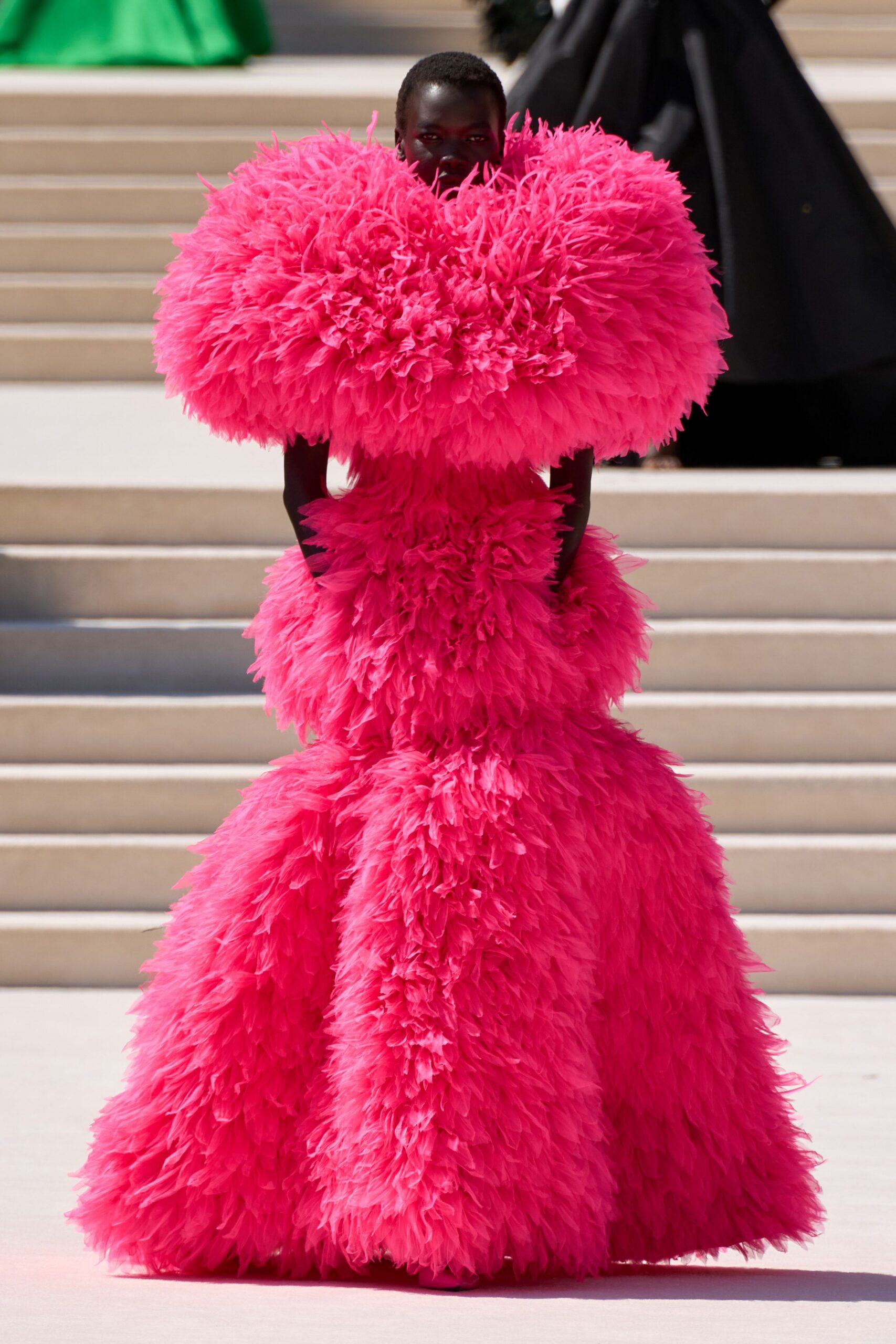 pink feathered gown