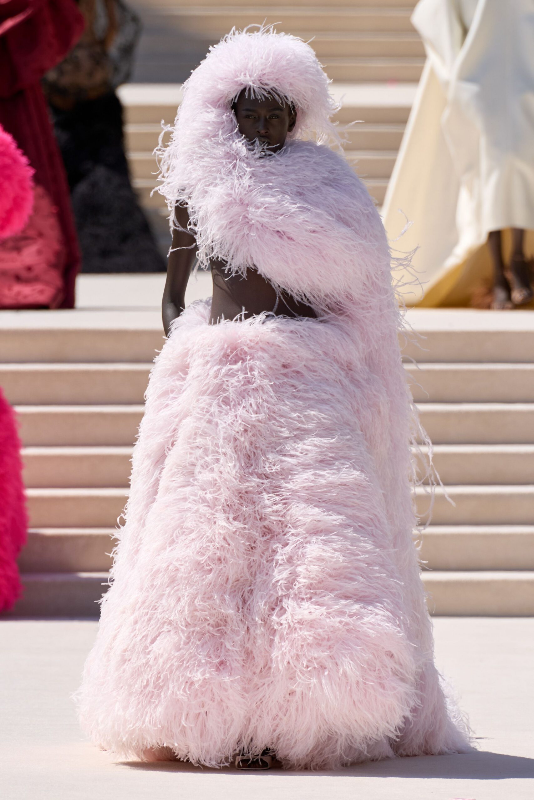 pink feathered gown