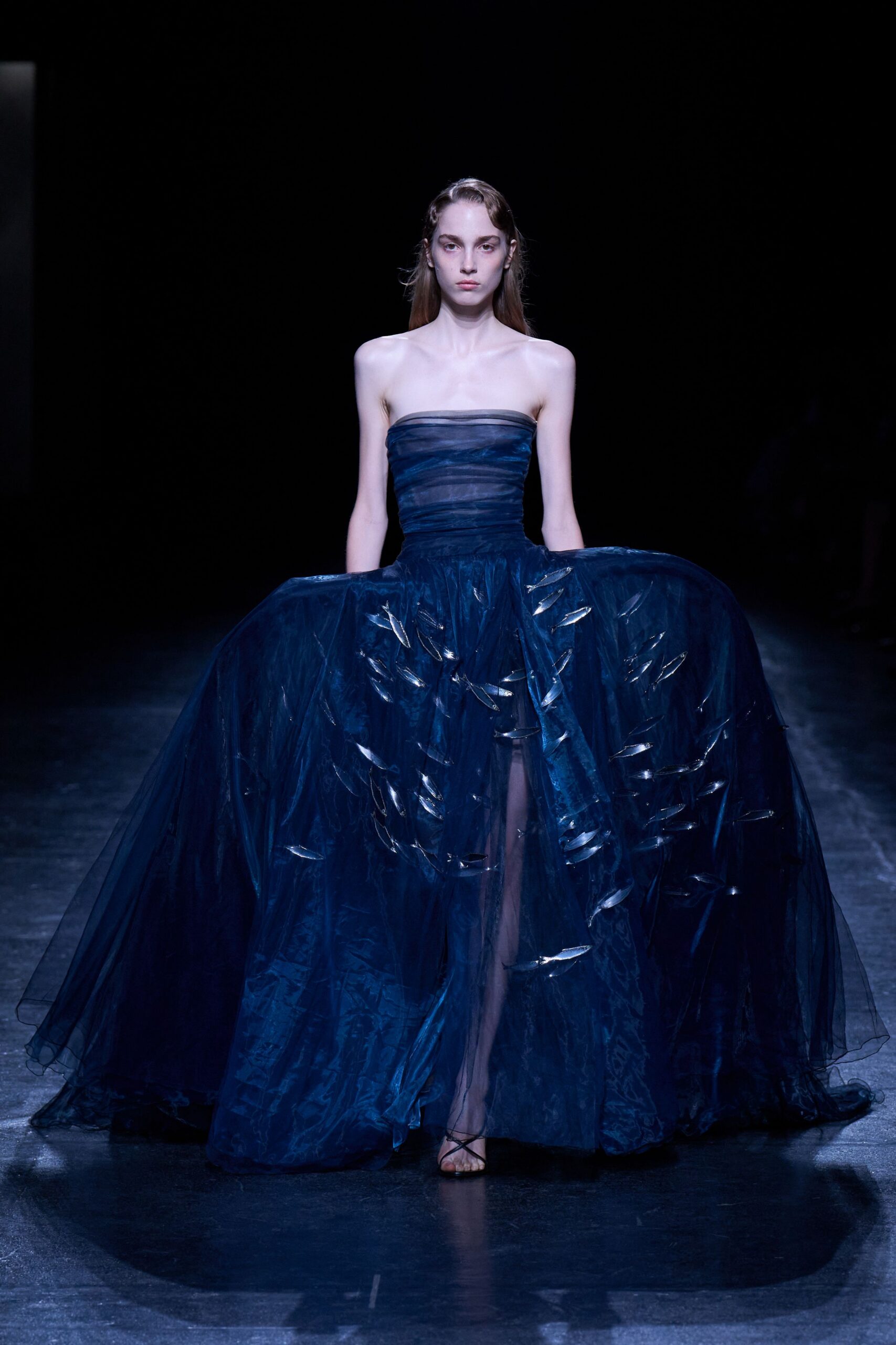 blue strapless flowing gown