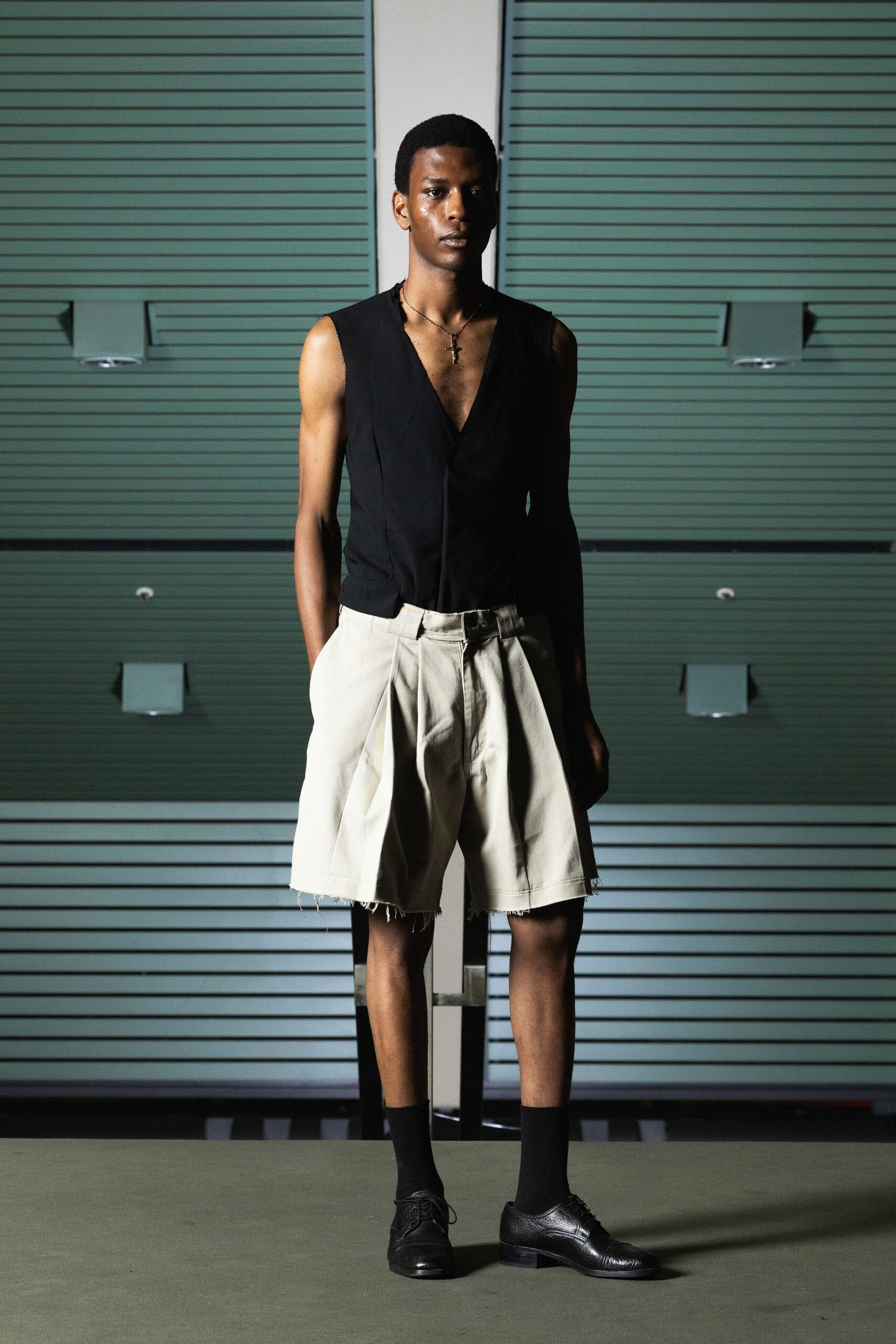 black cotton sleeveless v-neck fitted top