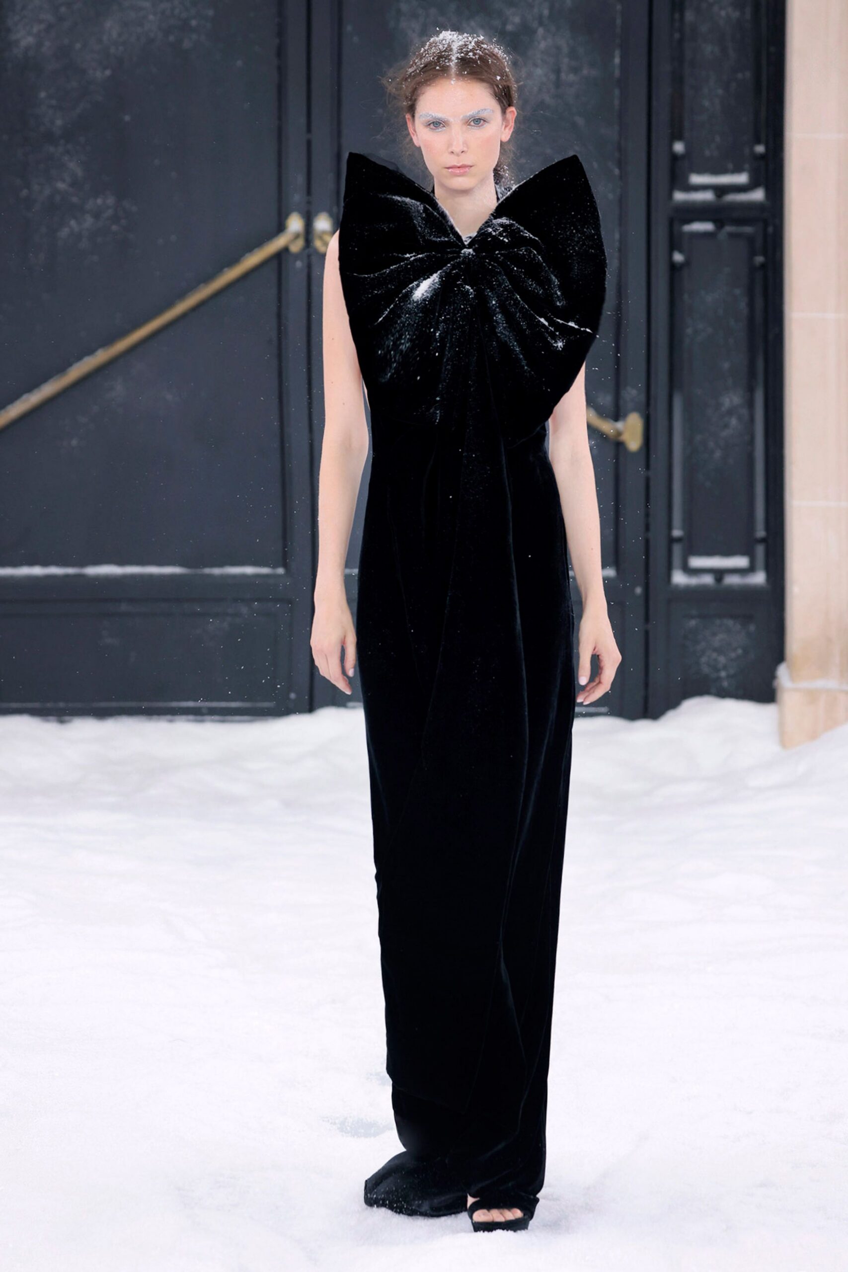 black velvet sleeveless high-neck fitted draped shiny gown